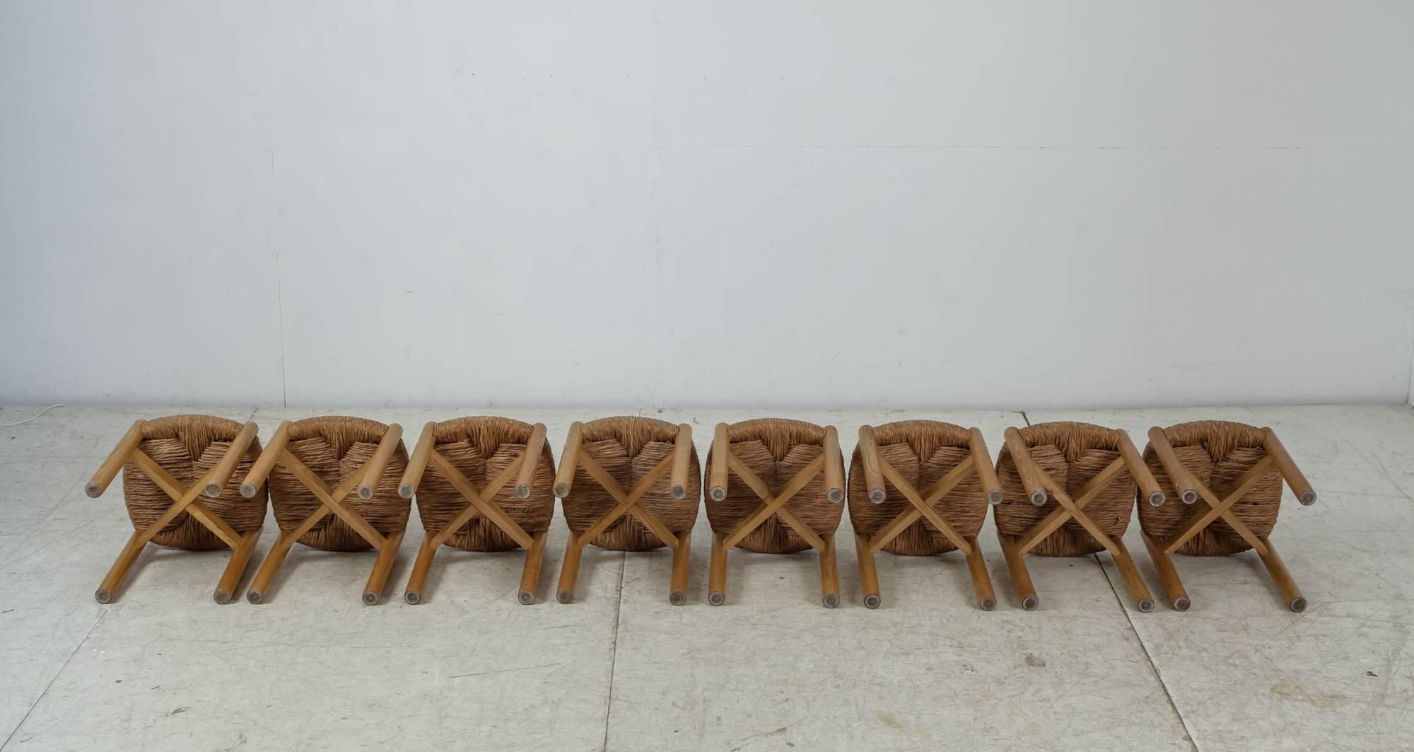 Mid-Century Modern Charlotte Perriand Set of Eight Oak and Rush Méribel Stools, France, circa 1950 For Sale