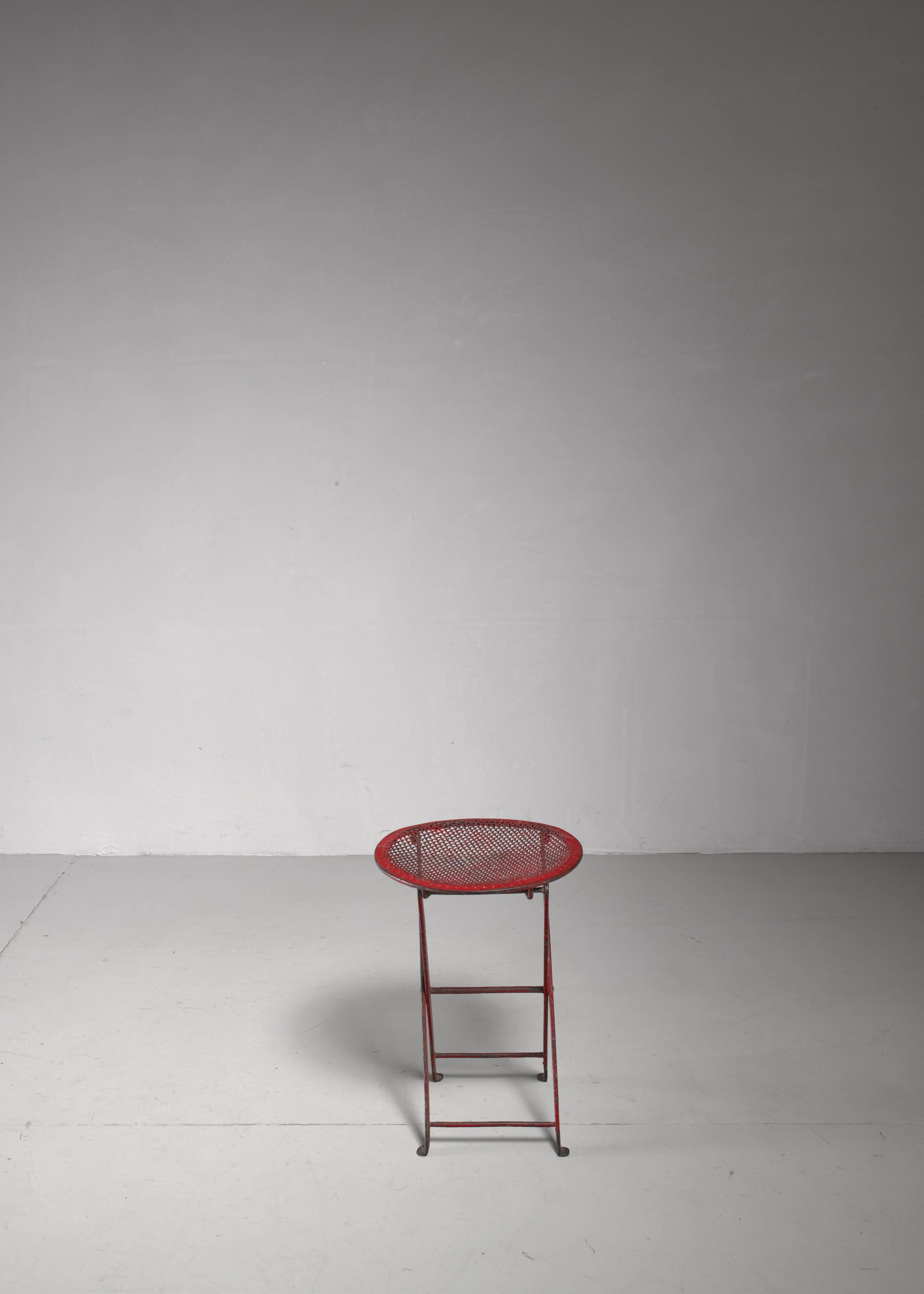 red metal stools