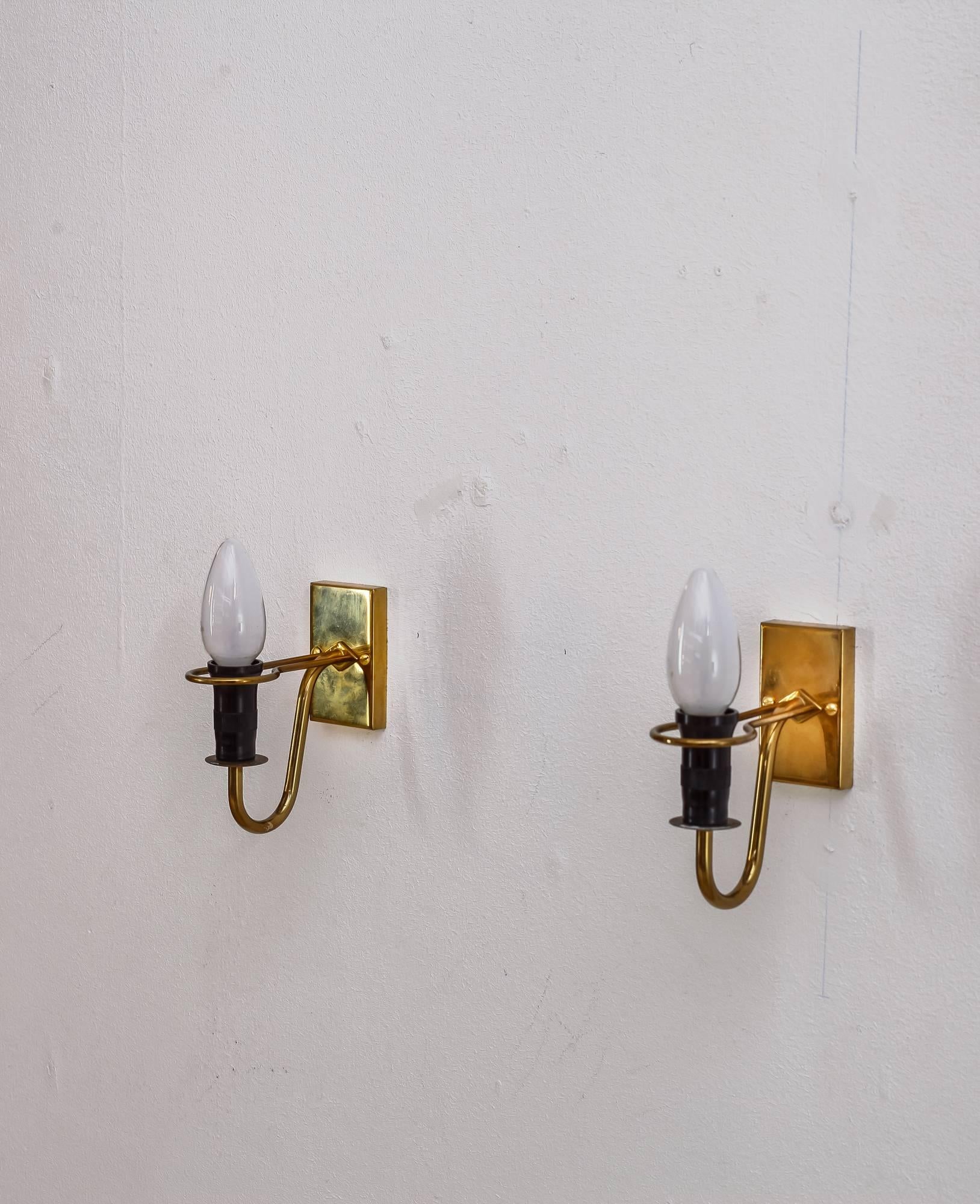 Scandinavian Modern Asea brass and opaline glass bedside wall lamps, Sweden, 1950s