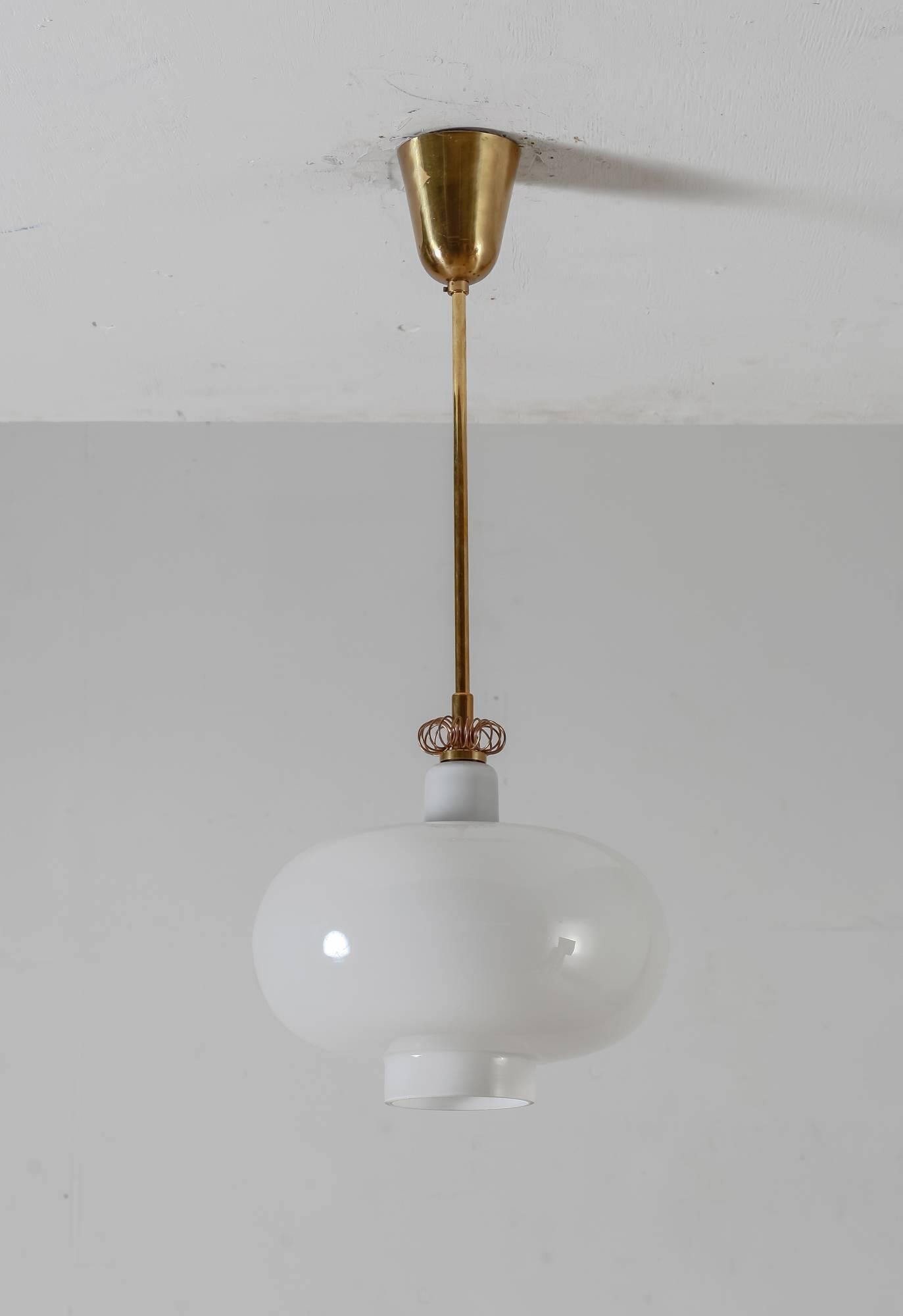 Scandinavian Modern Paavo Tynell K2-19 opaline glass and brass pendant, Idman, Finland, 1950s For Sale