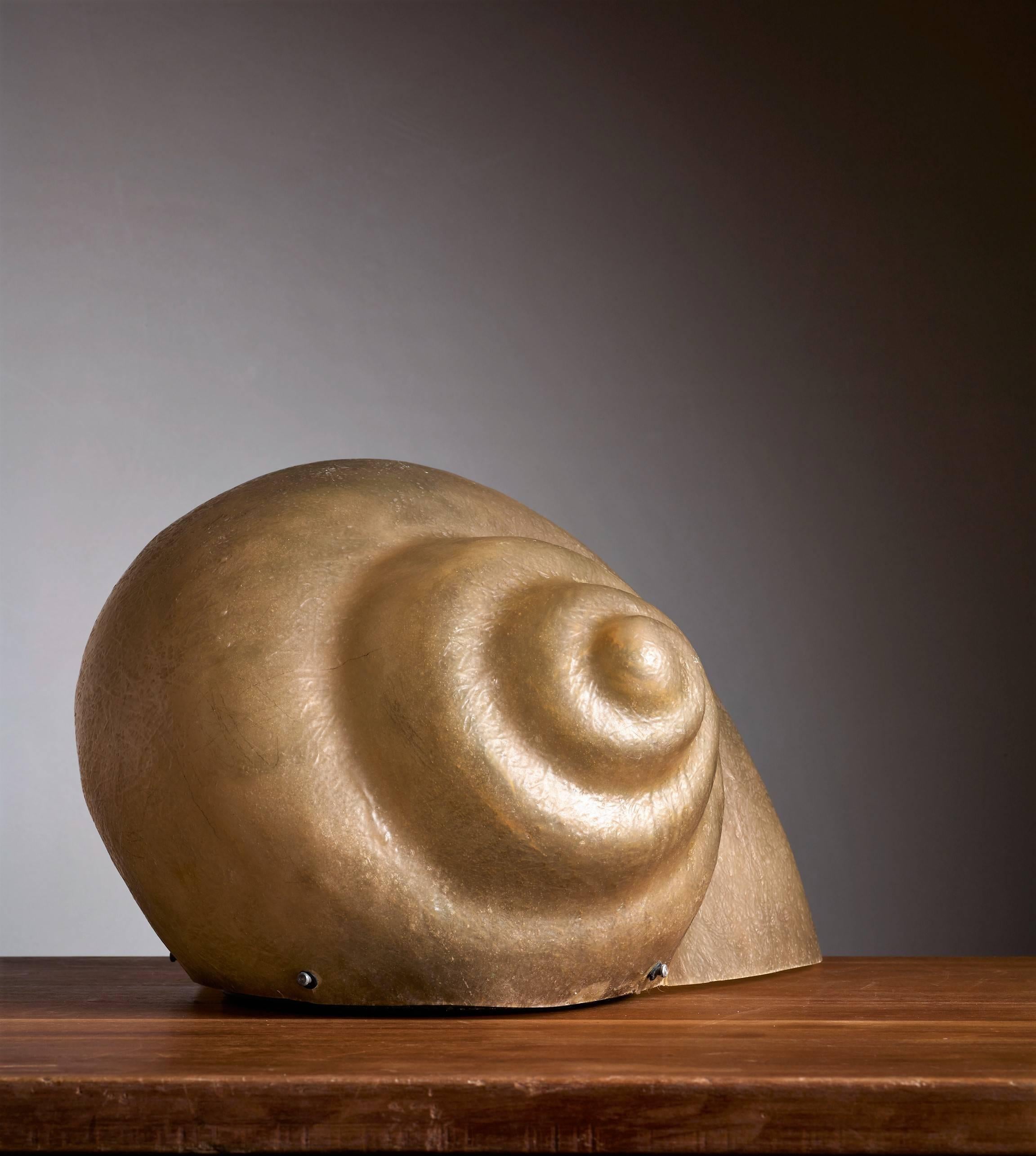 A floor or table lamp by Sergio Camilli for Bieffeplast, Italy, 1974. This lamp in the shape of a snail is made of a semi-transparent fiberglass.
