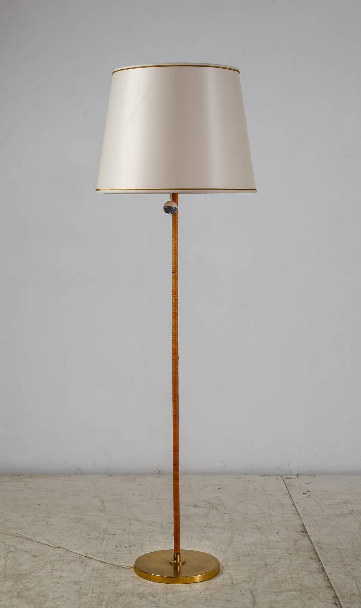 Scandinavian Modern Brass Floor Lamp with Cane Covered Stem, Finland, 1950s For Sale