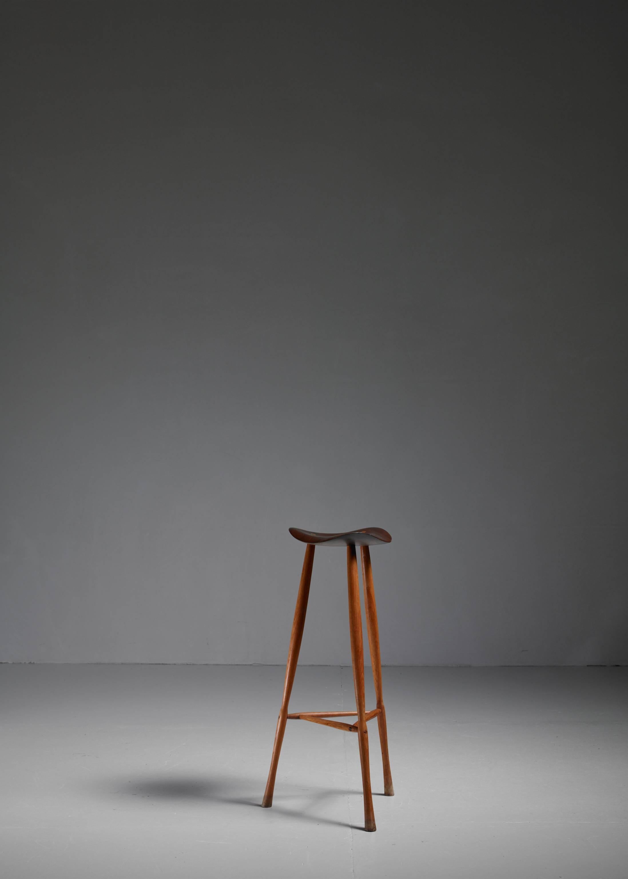 A high Benin teak stool by American craftsman Karl Seemuller. The stool is signed and dated '8-4-73'. The sculpted seating has a diameter of 26.5 cm (10.5").
* This is piece is offered to you by Bloomberry, Amsterdam * 