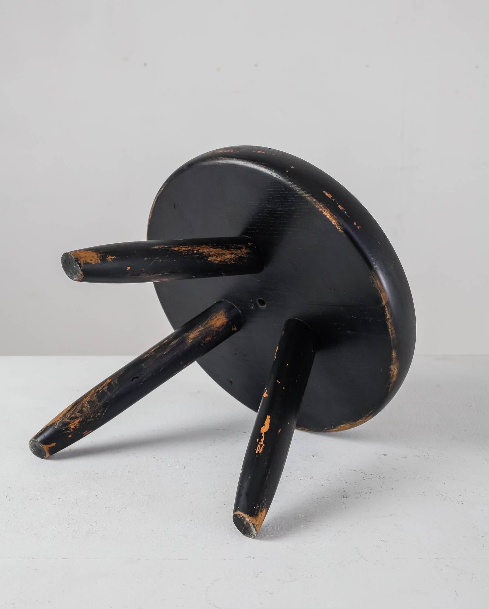 Mid-Century Modern Charlotte Perriand Low Black Ash Tripod Stool, France, 1950s-1960s For Sale