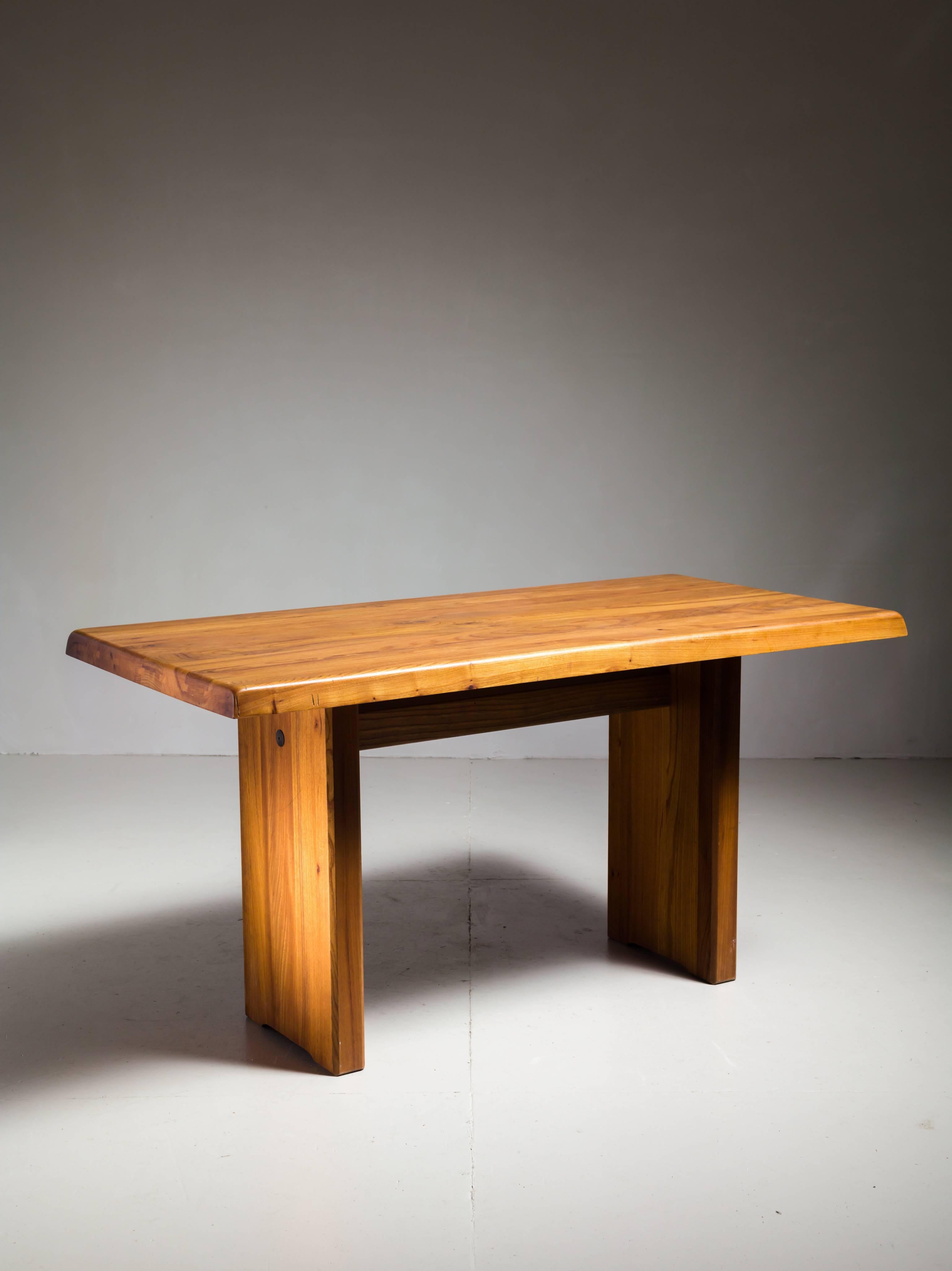 A model T14A dining table in the Campagne style, by French designer Pierre Chapo. The solid elm has a beautiful warm color and is in a great condition. The table has the wonderful connections that Chapo's works is known for.
Matching benches also