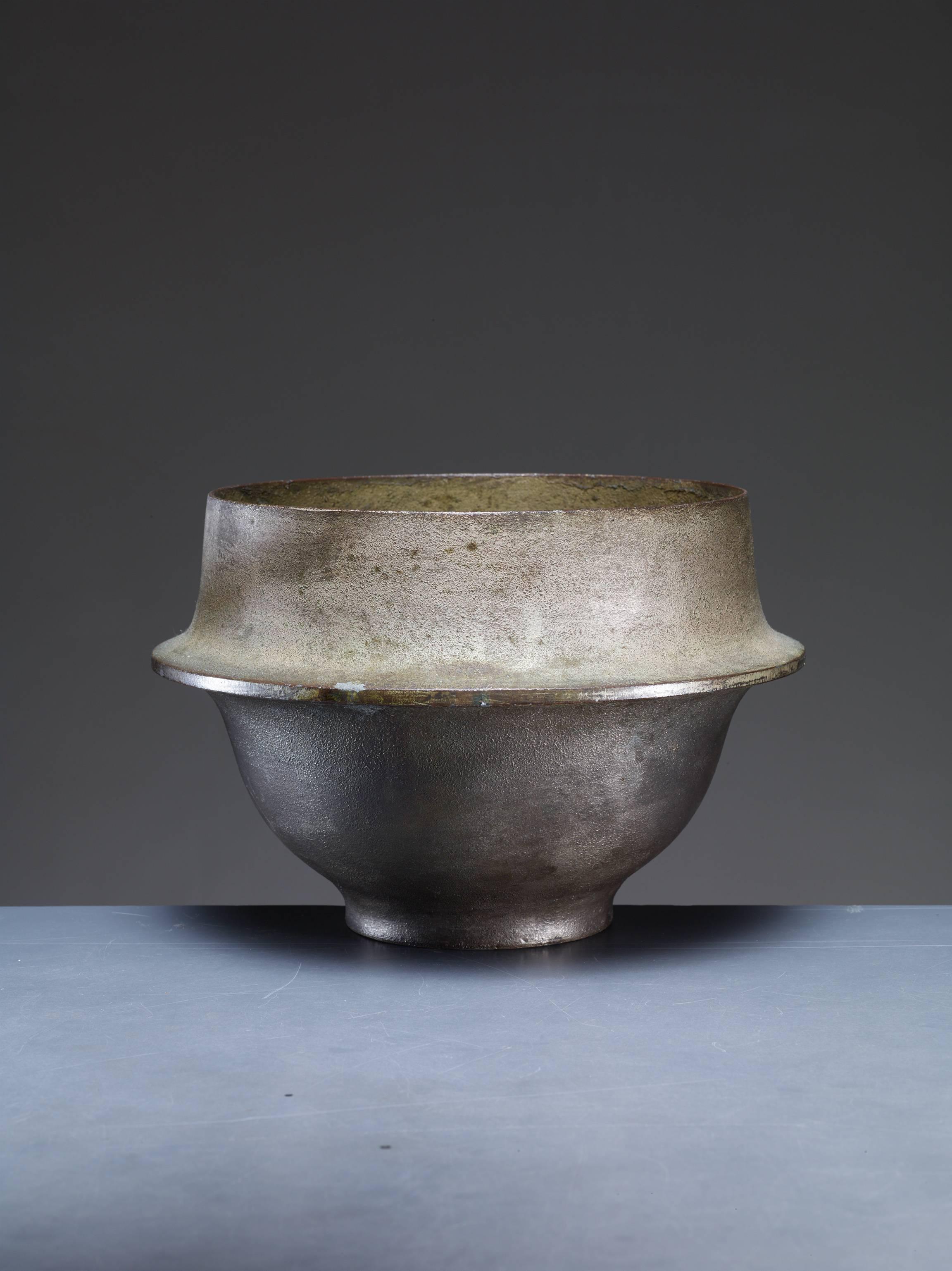 A sculptural sand cast and brushed metal bowl by Italian sculptor Lorenzo Burchiellaro from 1968 and stamped.