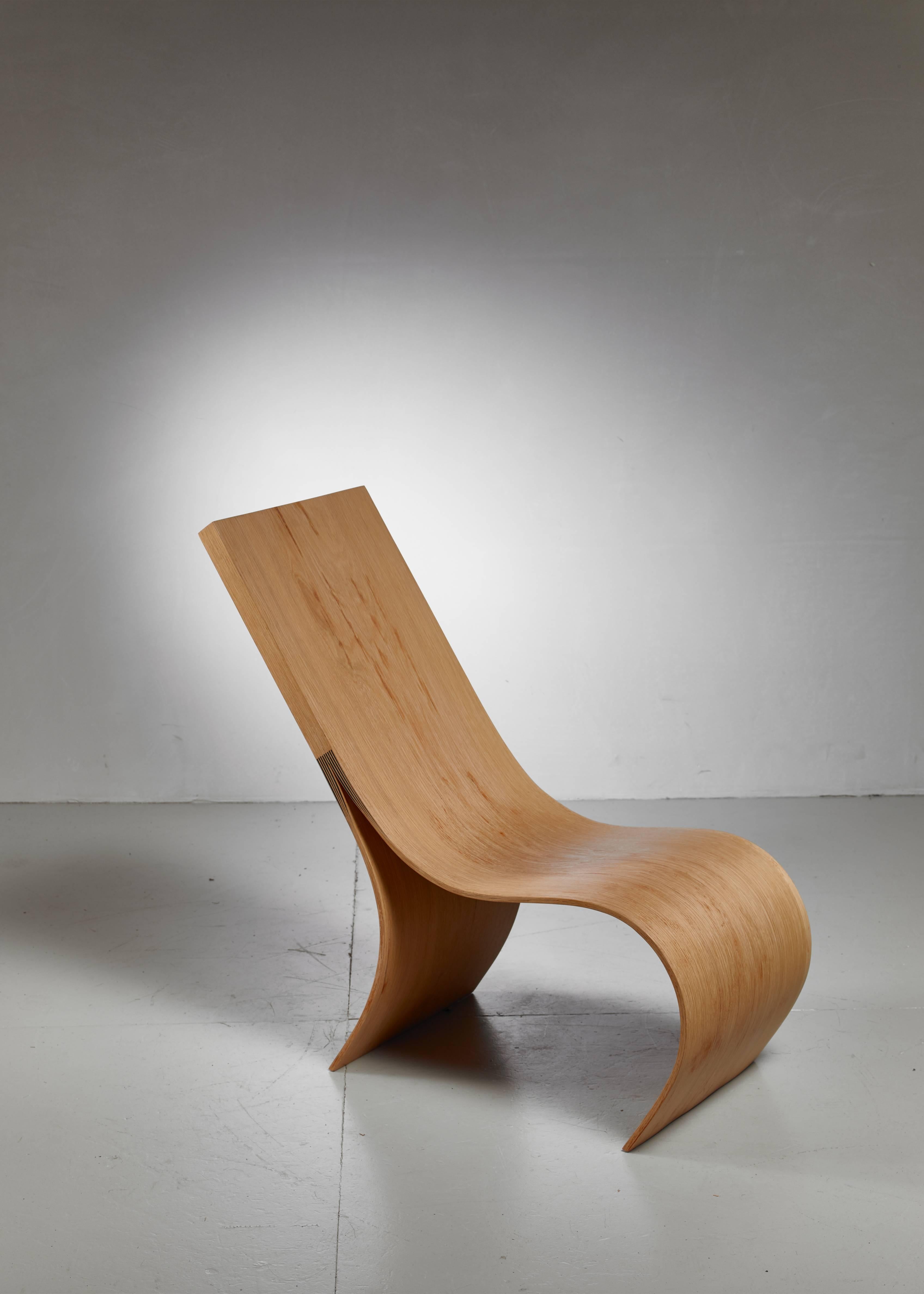 A hand formed lounge chair made from a solid piece of oak from a naturally fallen tree, by Belgian artist Kaspar Hamacher.

Hamacher (1981), son of a forester, uses nature as the main inspiration for his work, with wood being his preferred