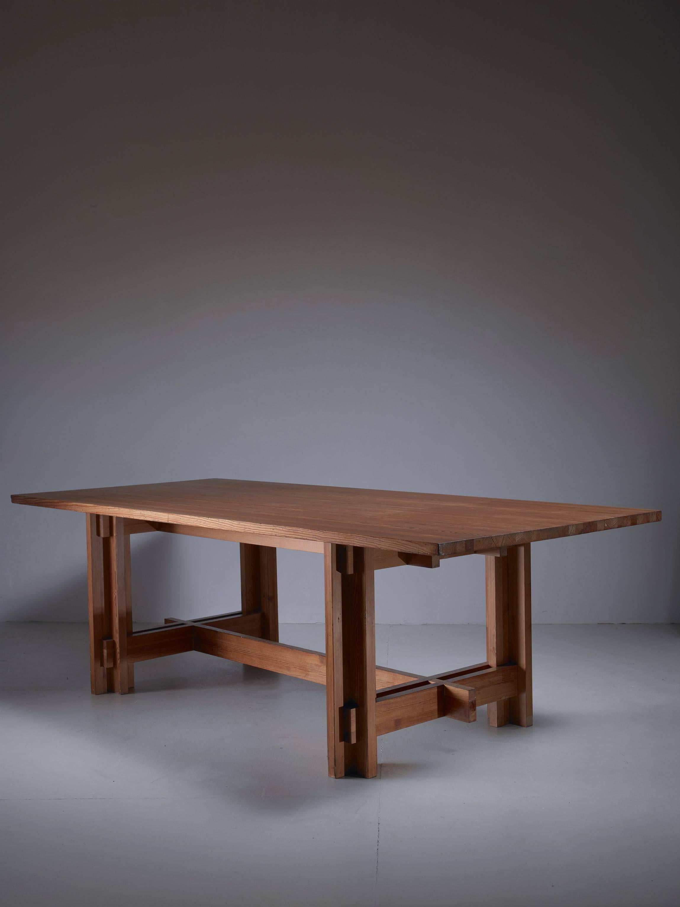 A large, architectural dining table in American pine by Austrian architect Peter Schmid. Wonderful constructional base and mildly aged tabletop.

Professor Peter Schmid (1935) is an architect and engineer who has worked in Austria, Germany and the