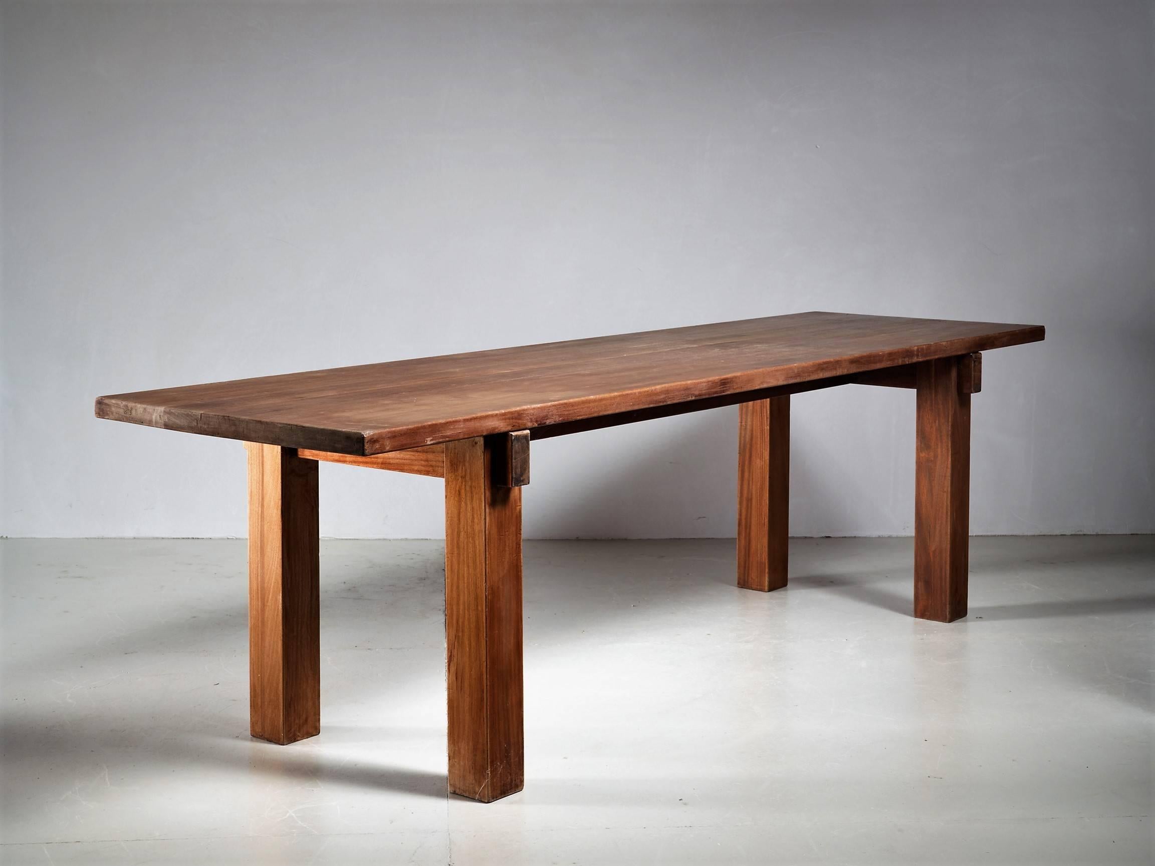 A stunning 'Brazil' table by Charlotte Perriand in a beautiful dark teak. Charlotte Perriand originally designed and used this table herself as a console table in her apartment in Rio de Janeiro. It has the great Perriand combination of solid wood