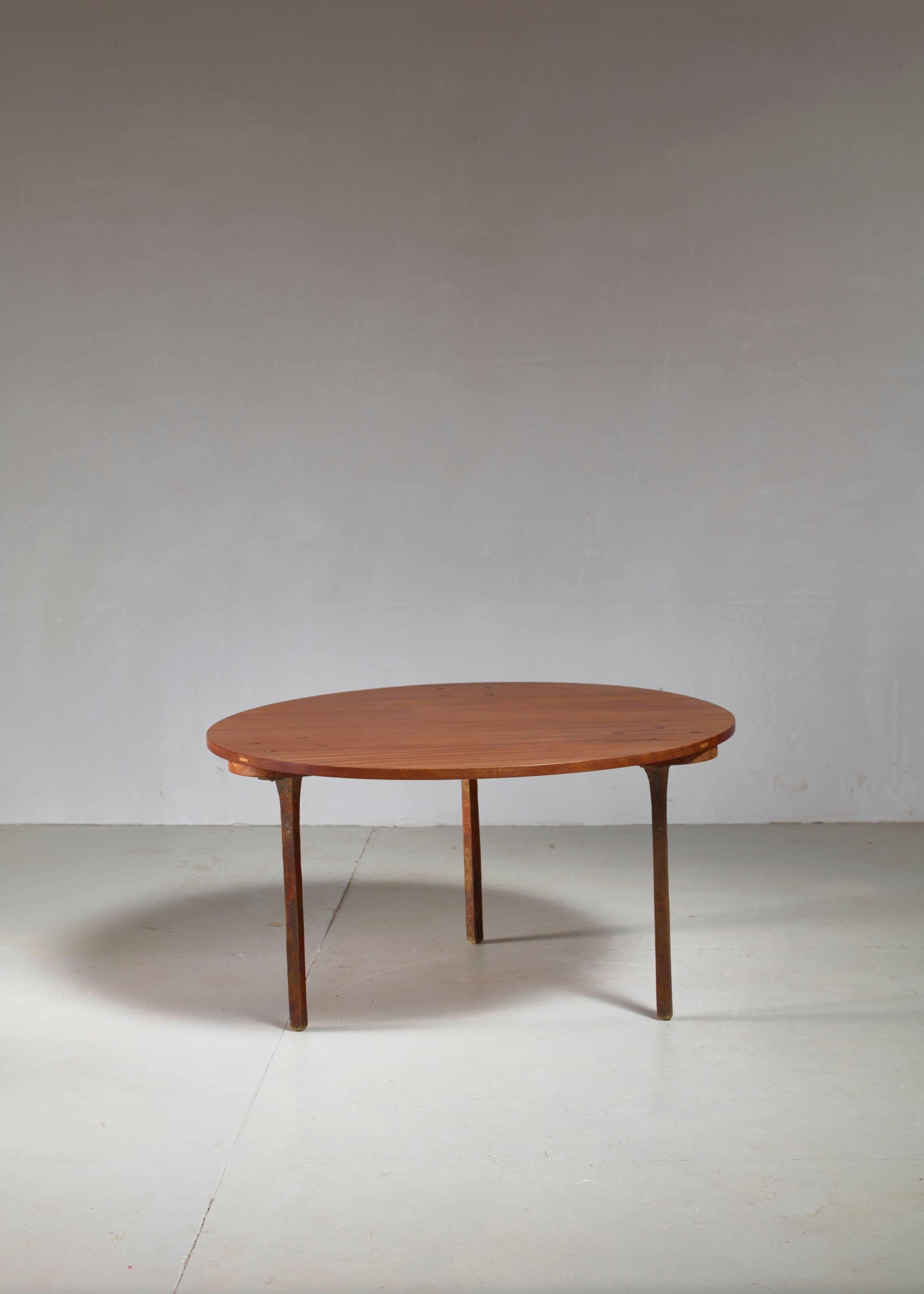 A very rare studio crafted coffee table by German sculptor Paul Dierkes. He only made a couple of pieces of this design in the 1950s and this might be the only one to have survived. 

This table shows Dierkes' great appreciation for material, with a