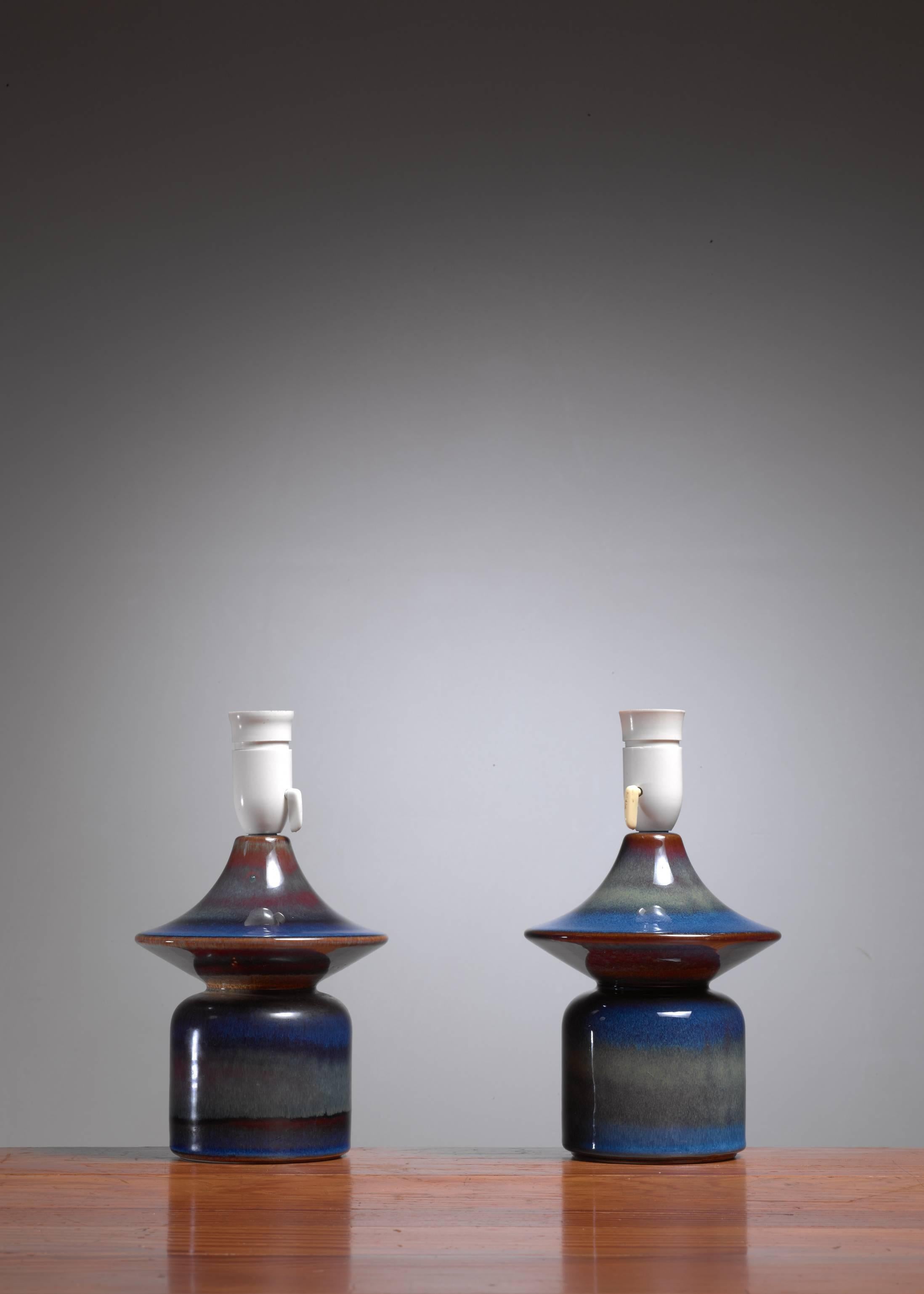 A pair of blue ceramic table lamps by Søholm Stentøj, Denmark.
Marked by Søholm and in a wonderful condition.
 