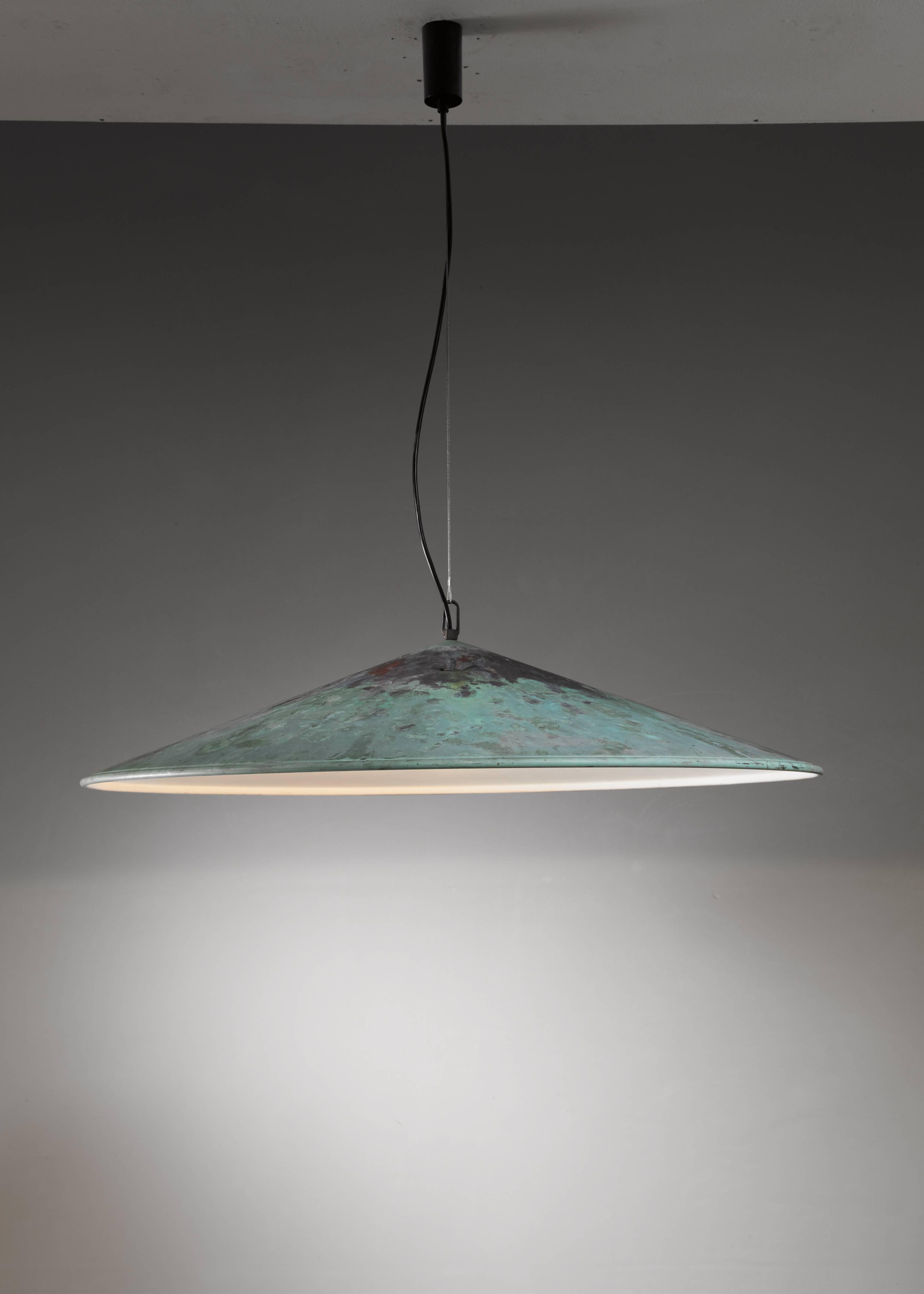 A very large (82 cm diameter) pendant lamp in verdigris copper, attributed to Danish designer Henning Larsen. We have a matching second lamp available to make a pair.

        