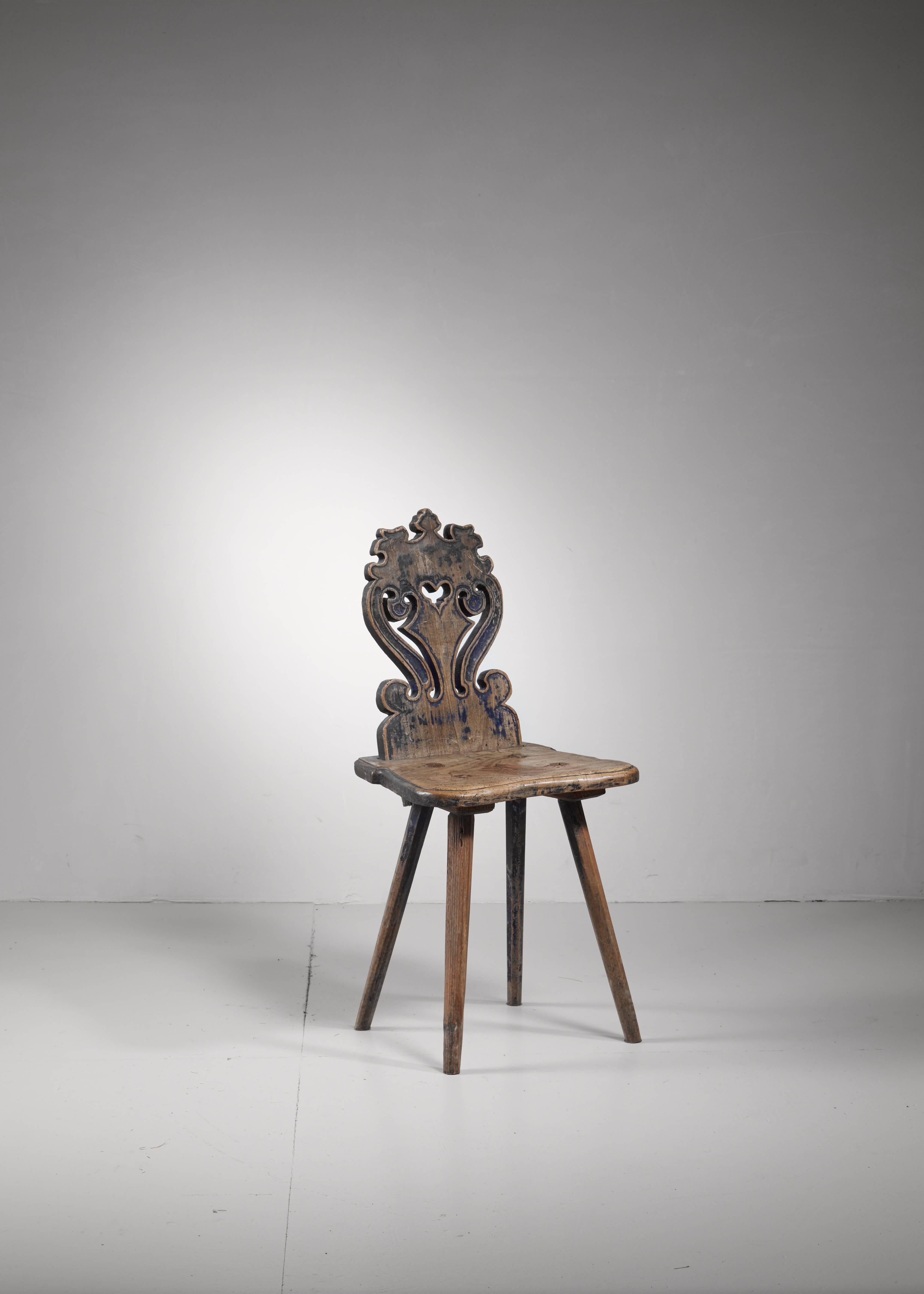 A 19th century folk art chair from Sweden (probably Blekinge in the south). The chair stands on four tapering legs and has a beautifully carved backrest.
* This piece is curated for you by Bloomberry *