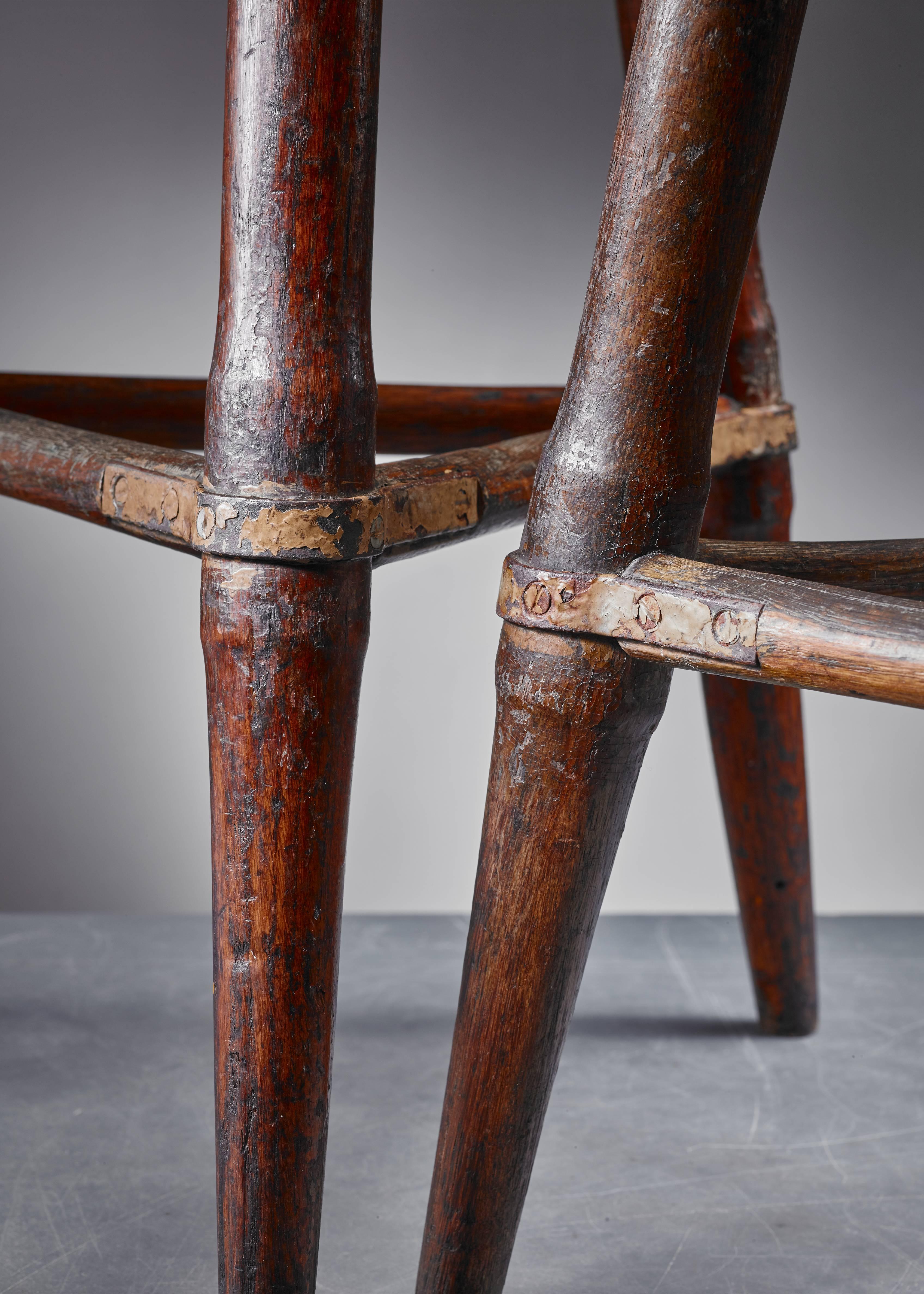 Swedish Pair of High Scandinavian Wooden Tripod Stools with Iron Connections, 1930s For Sale