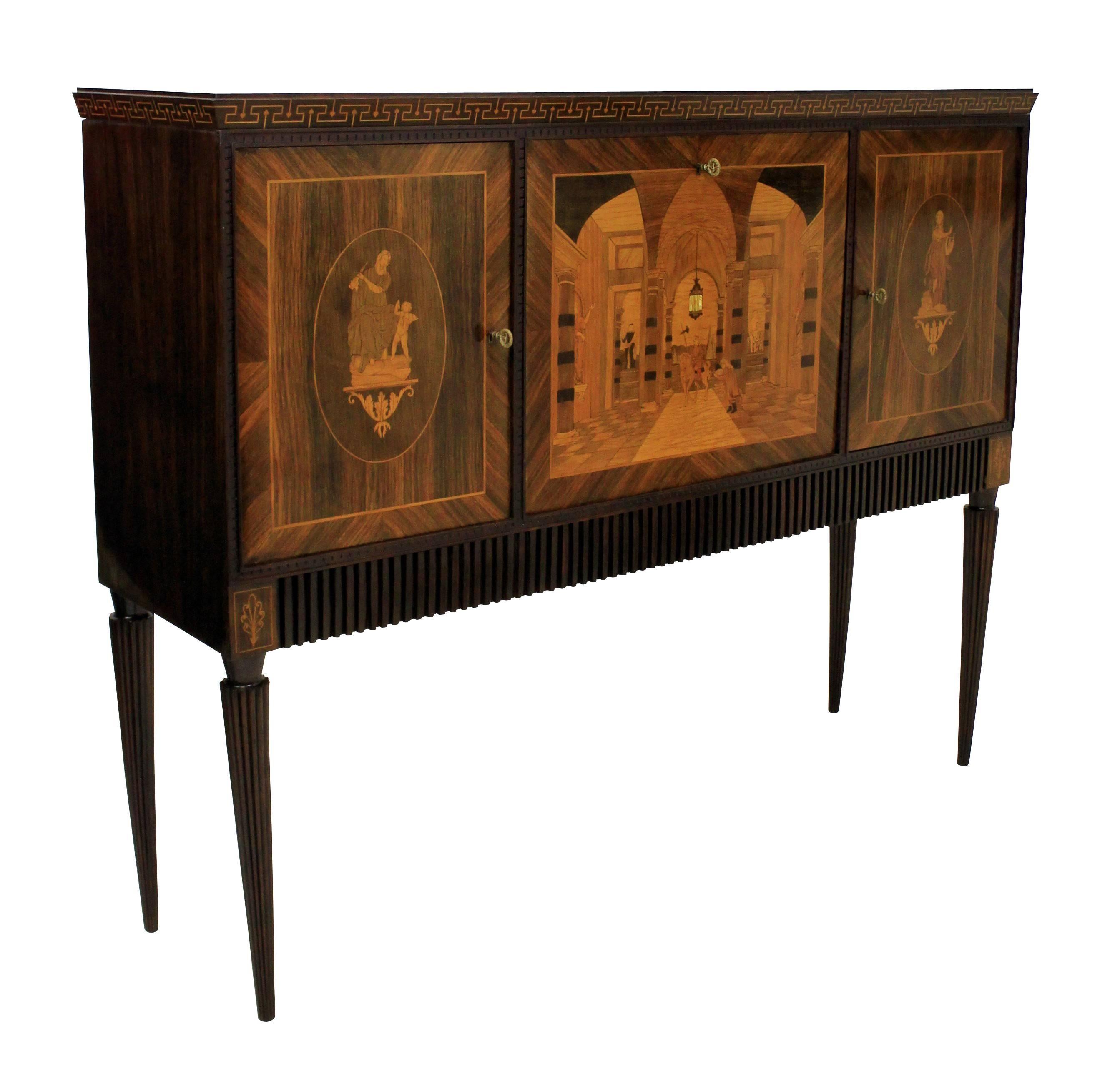 A large Italian bar cabinet of good quality, with marquetry classical scenes, including a mother-of-pearl inlay in the central lantern which gives the appearance of a glowing light. With Greek key design and on fluted tapering legs. The inside