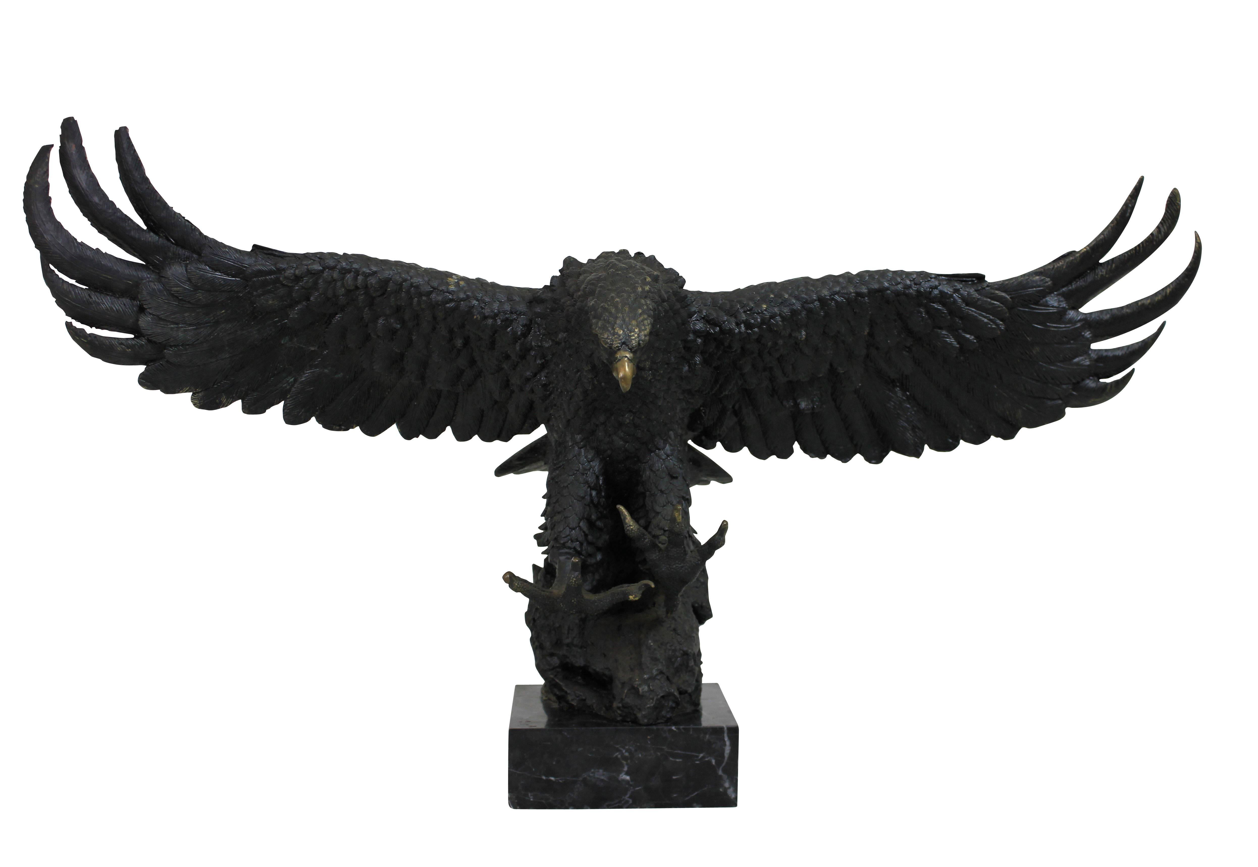 A large French patinated bronze eagle on a marble plinth, of fine detail, especially the feathers.
                          
