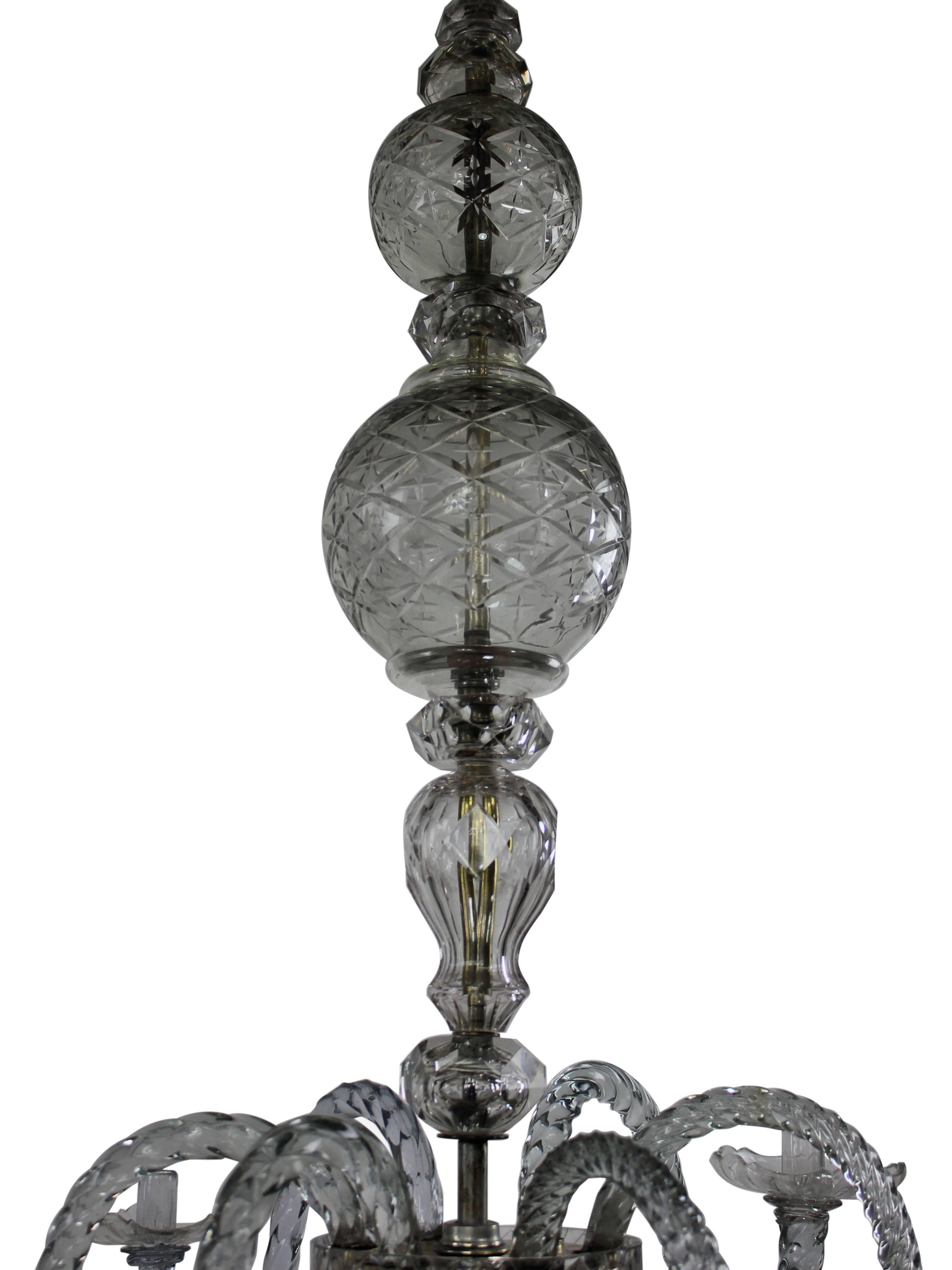 A rare English George III cut-glass baluster chandelier of fine quality. This chandelier is one of the earliest forms of glass chandelier, the form mimicking that of the early English and Dutch chandeliers in brass. These chandeliers are rare