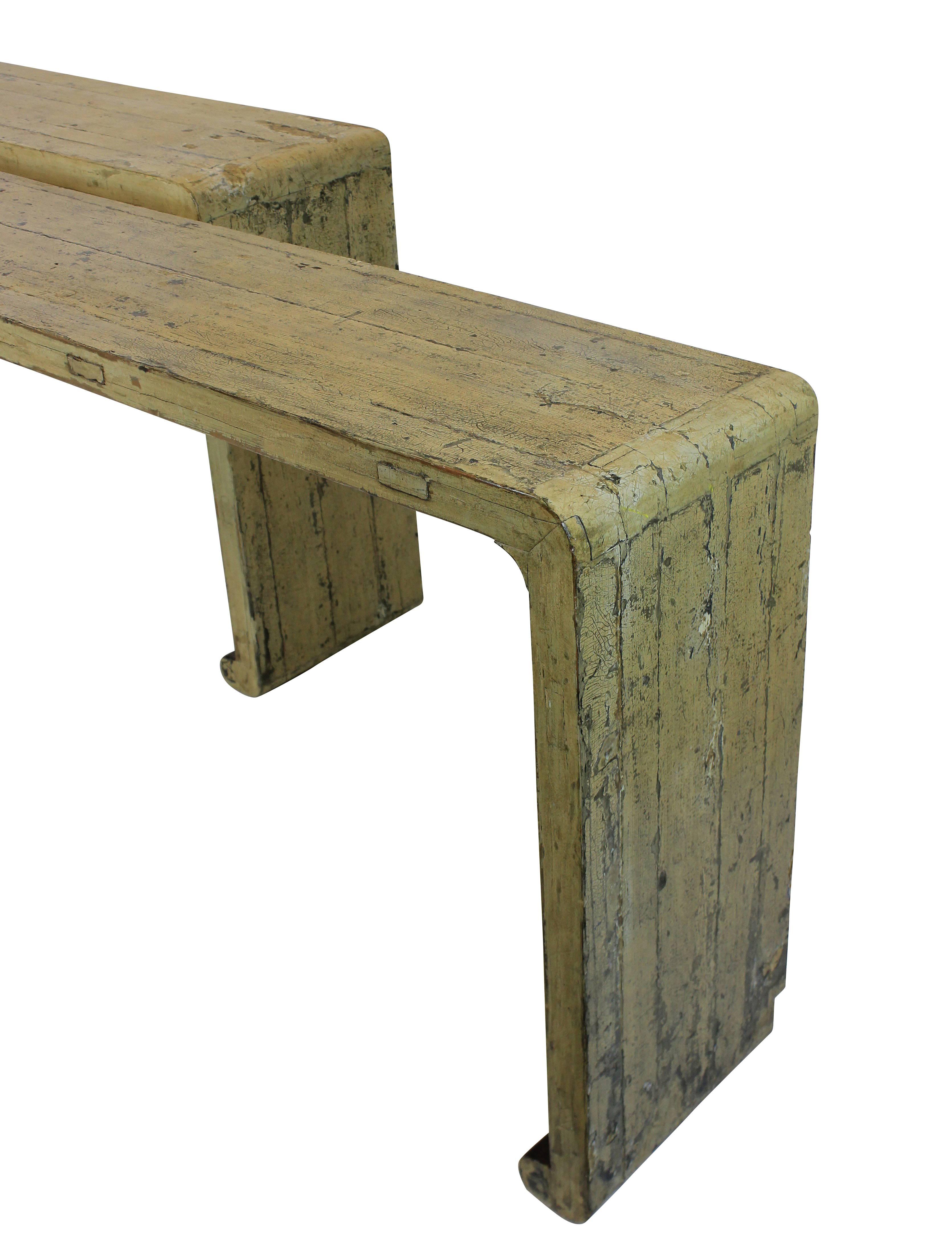 A pair of large 19th century Chinese console tables of impressive scale. In pale lacquered hardwood, which has a nice crackled patina and sheen.
 