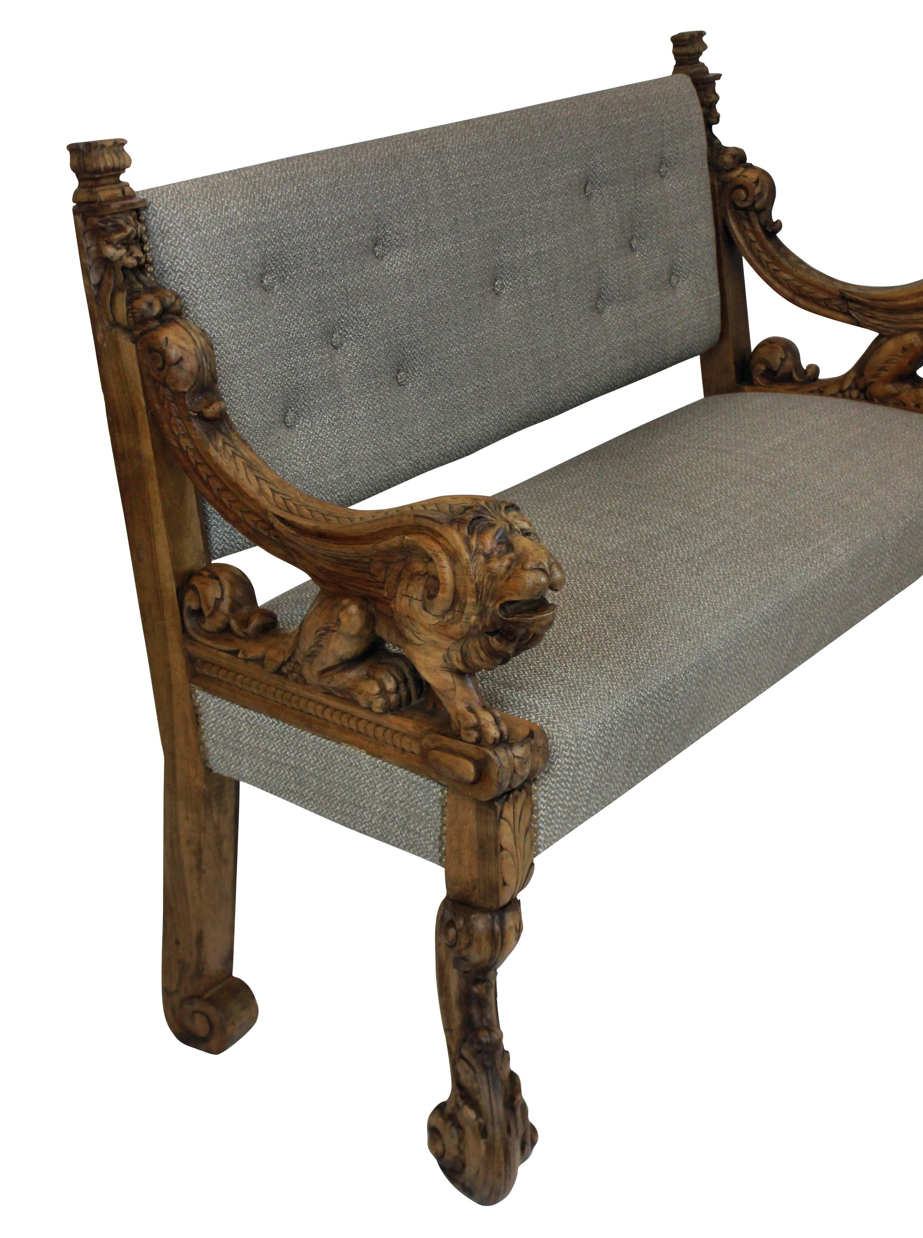An 18th century Venetian beautifully carved walnut settee. The arms depicting the winged lion of Saint Mark. Newly upholstered in Colefax & Fowler fabric.
 