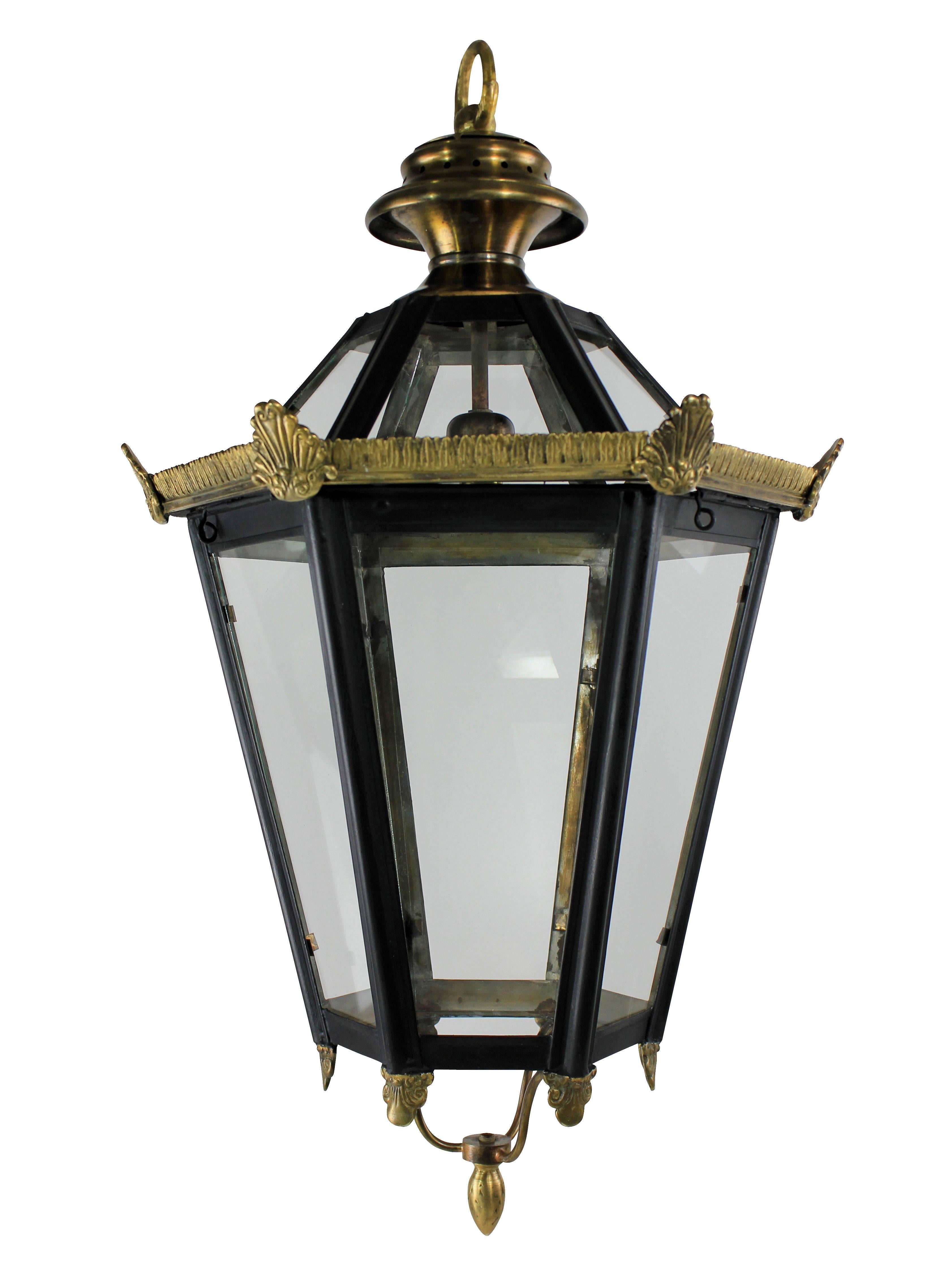 A pair of English hexagonal tapering hanging lantern in painted tole and brass with glazed panels

Newly electrified

Subjected to VAT.