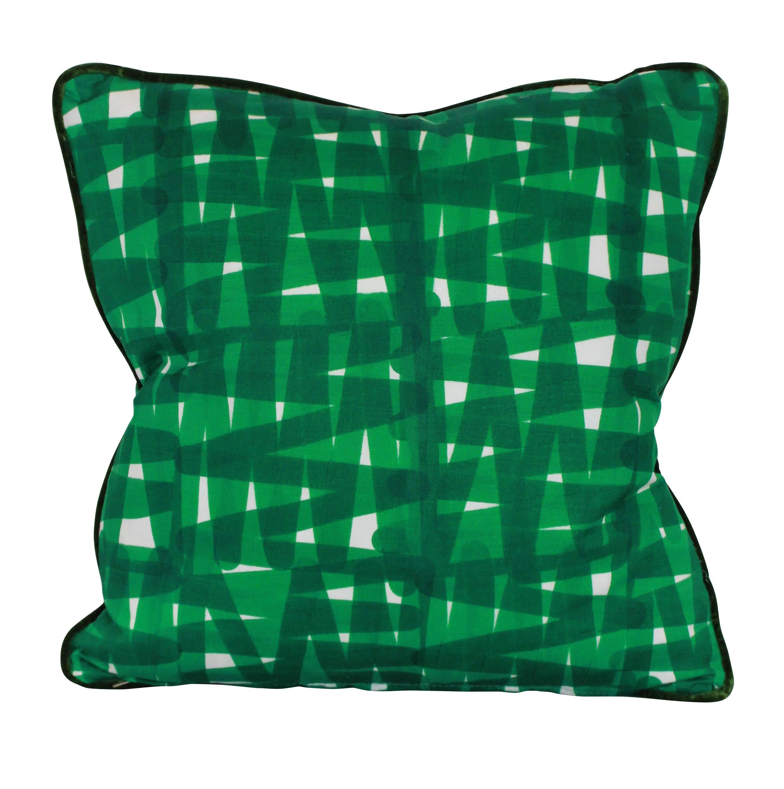 A set of four bespoke cushions in a vivid emerald green Livio de Simone fabric, piped with designers Guild velvet. With feather pads.

Sold individually.


