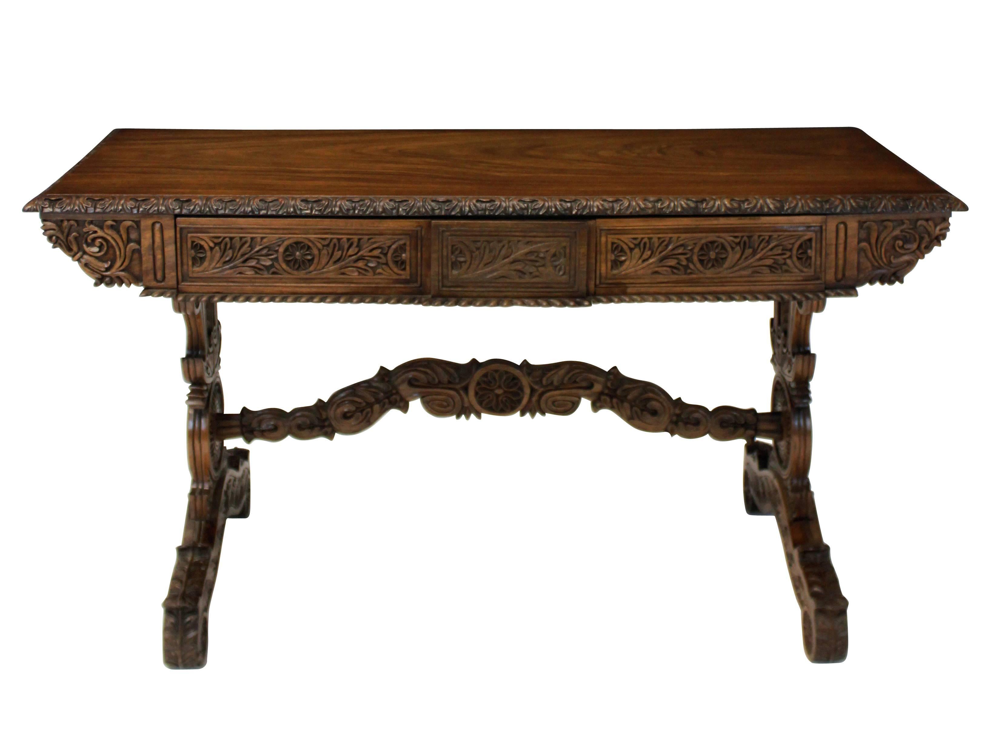 An Anglo Indian solid rosewood sofa table of superb quality. Carved throughout, with two frieze drawers.
 