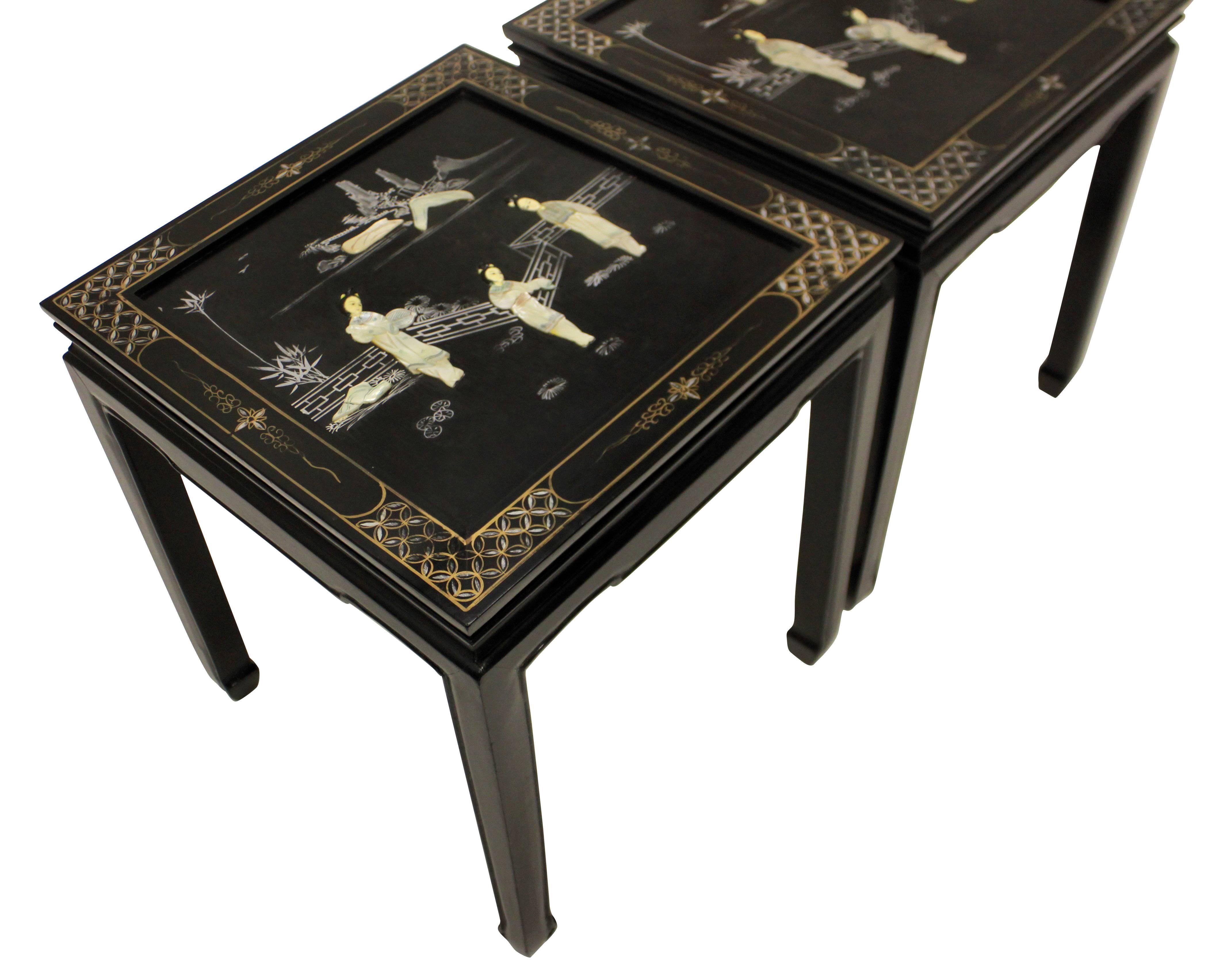 A pair of French Japanned side tables in black lacquer with ivory and mother-of-pearl detail.