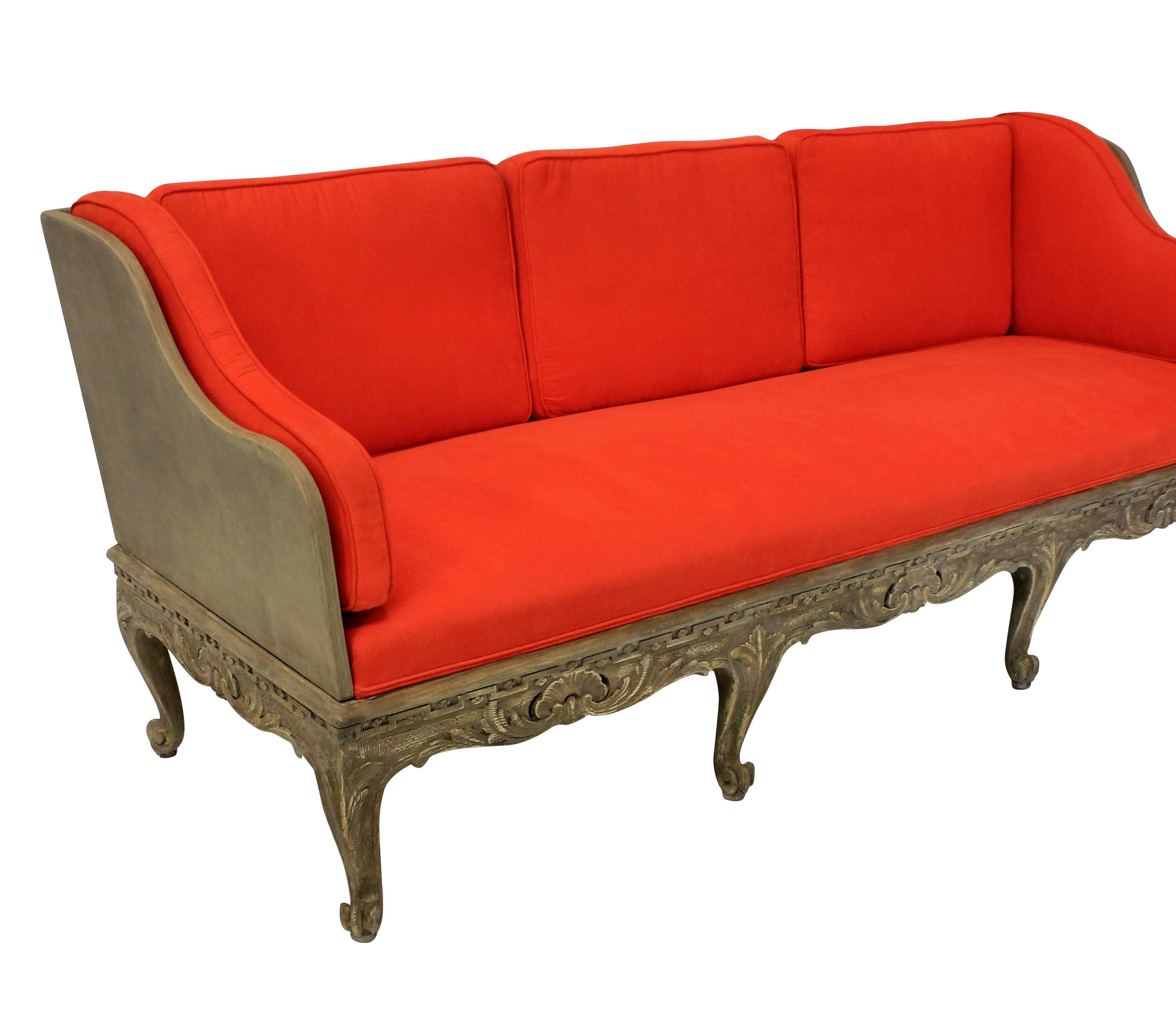 A large Swedish carved and painted daybed / settee of large proportions (would easily be suitable as a daybed for a man). The back lifts off and has its original horse hair filled cushions, newly upholstered in blood orange corduroy.


Measures: