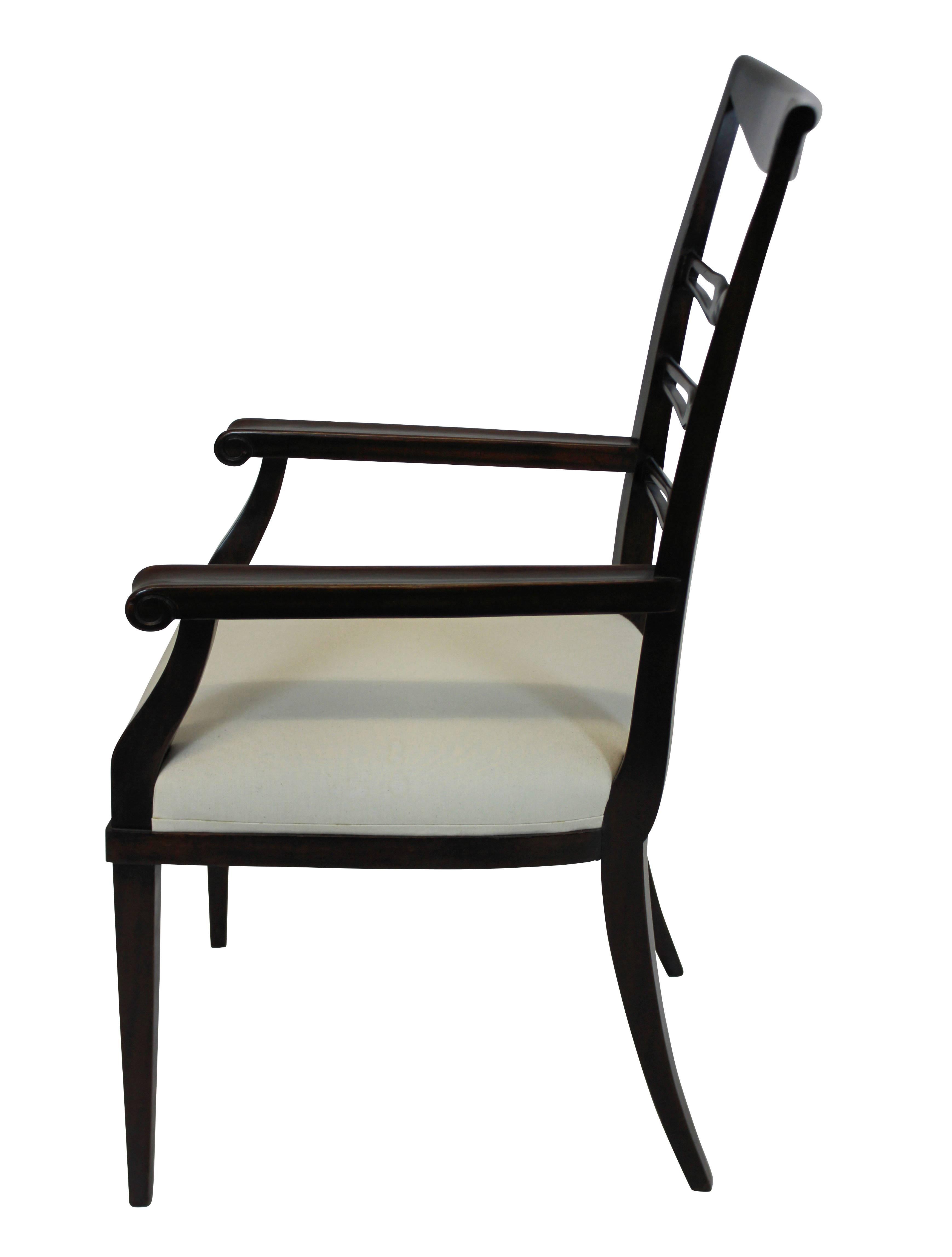 An Italian armchair in cherry wood by Paolo Buffa of fine quality. Newly upholstered in white Fermoie linen.
