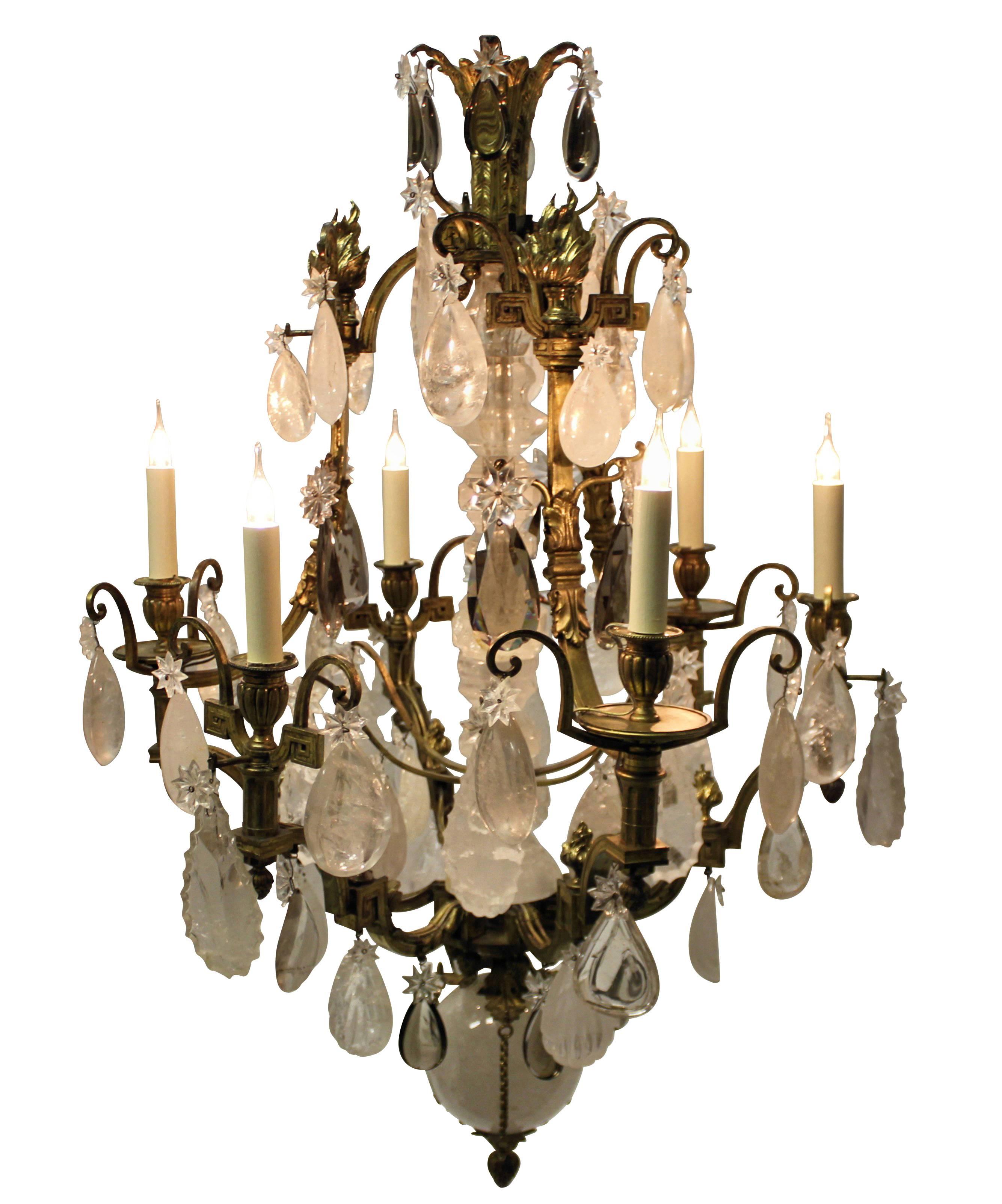 A fine Russian neoclassical gilt bronze and rock crystal chandelier with smoked quartz drops. Made in France for the Russian market.

The ball has a diameter of 18cm and the largest plaque is 18cm.