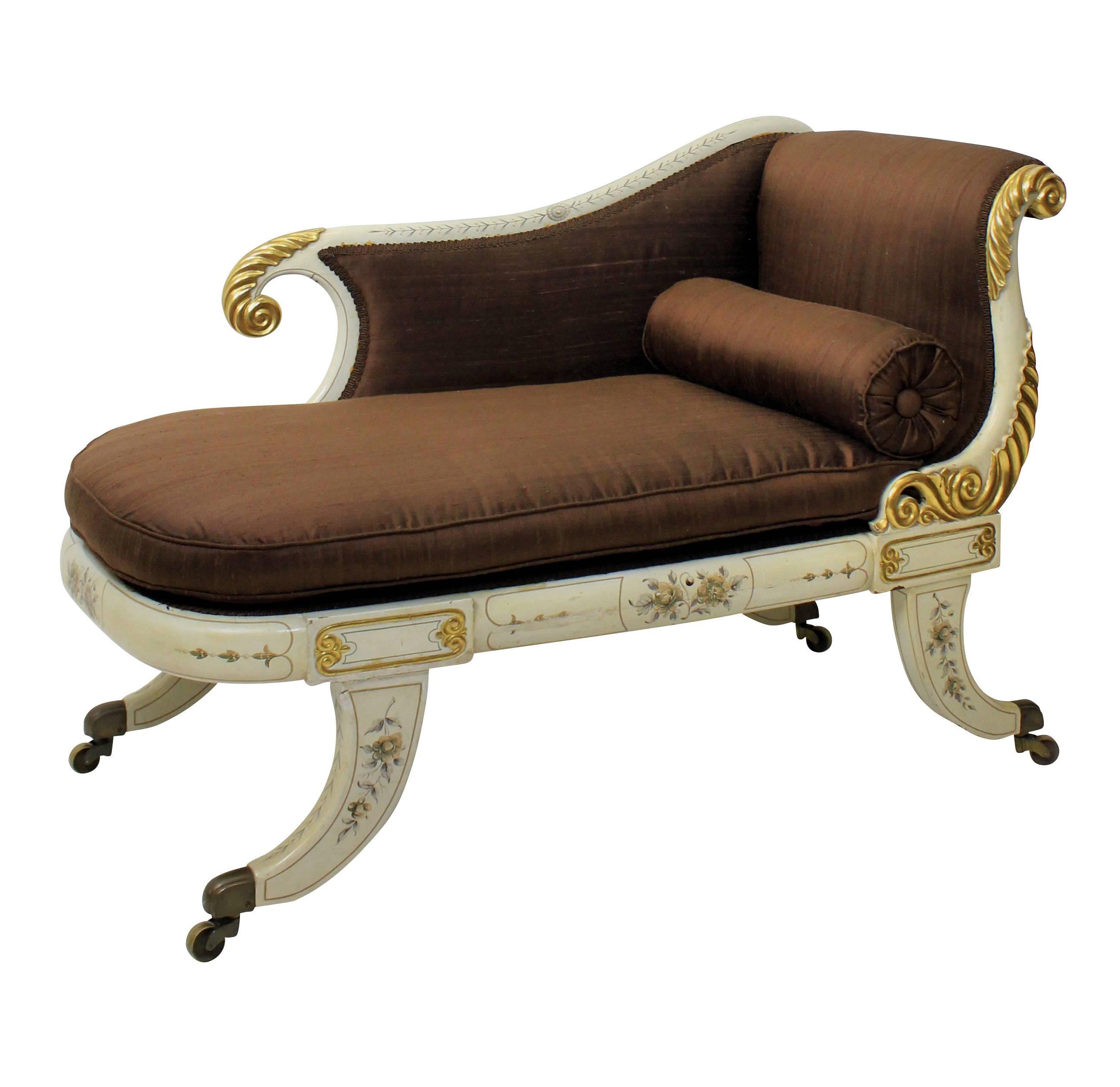 A Russian painted, water gilded  & decorated day bed, newly upholstered in brown silk.