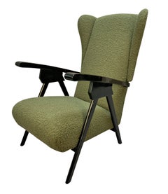 A Pair Of Stylish Italian Mid-Century Wing Back Armchairs