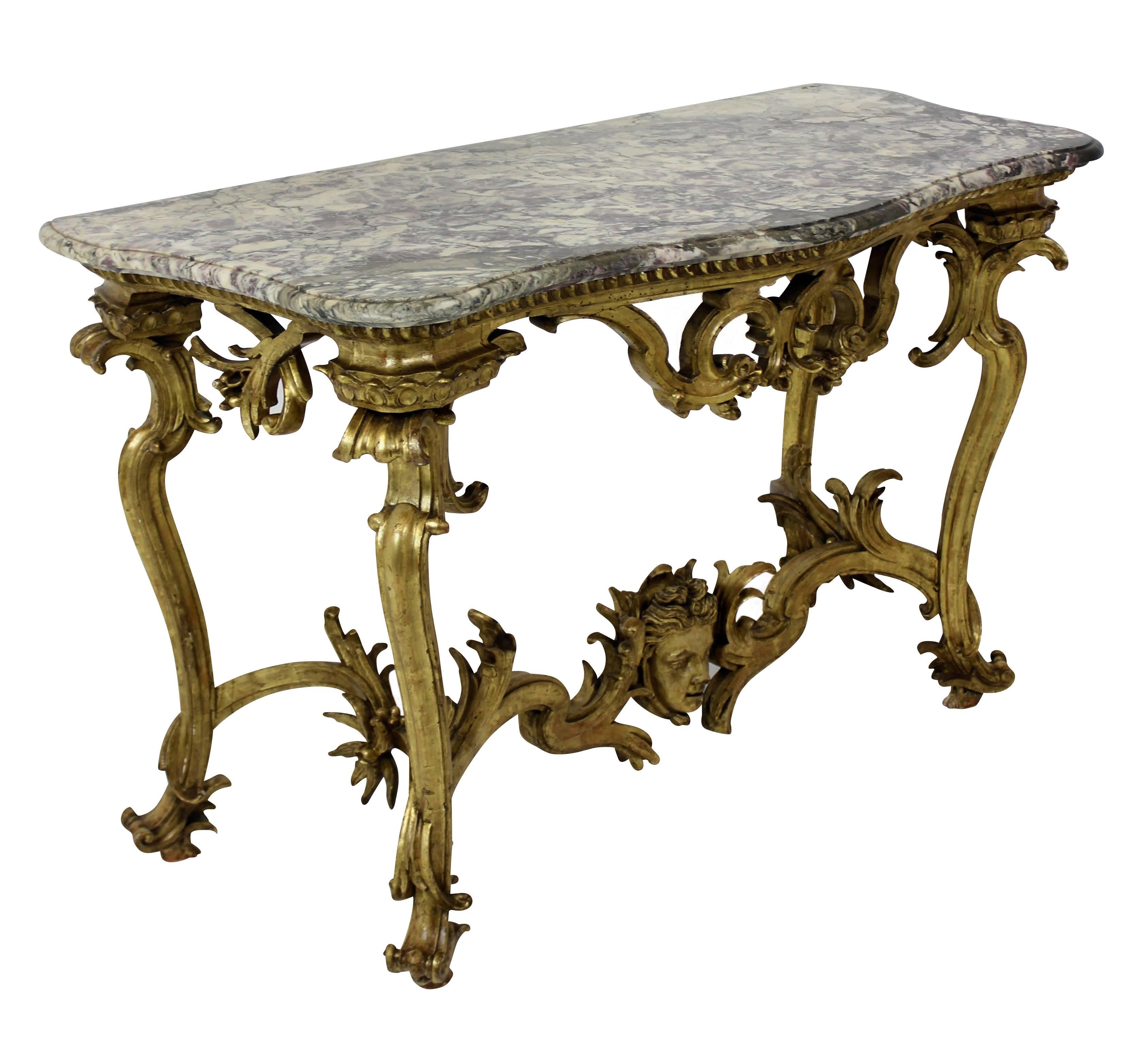 An exceptional George II giltwood console table, purchased in circa 1790 for the newly built Knocklofty House, Tipperary for the Earl of Donoughmore. It has remained in this splendid Georgian house until now, in the family wing and we purchased it
