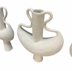 A Set Of Three Large Surrealist Sculptures In A Bisque Finish