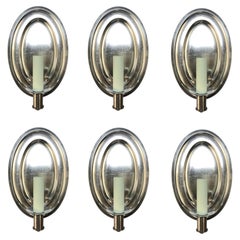 Un juego de seis apliques de pared chapados en plata, de estilo del siglo XVII