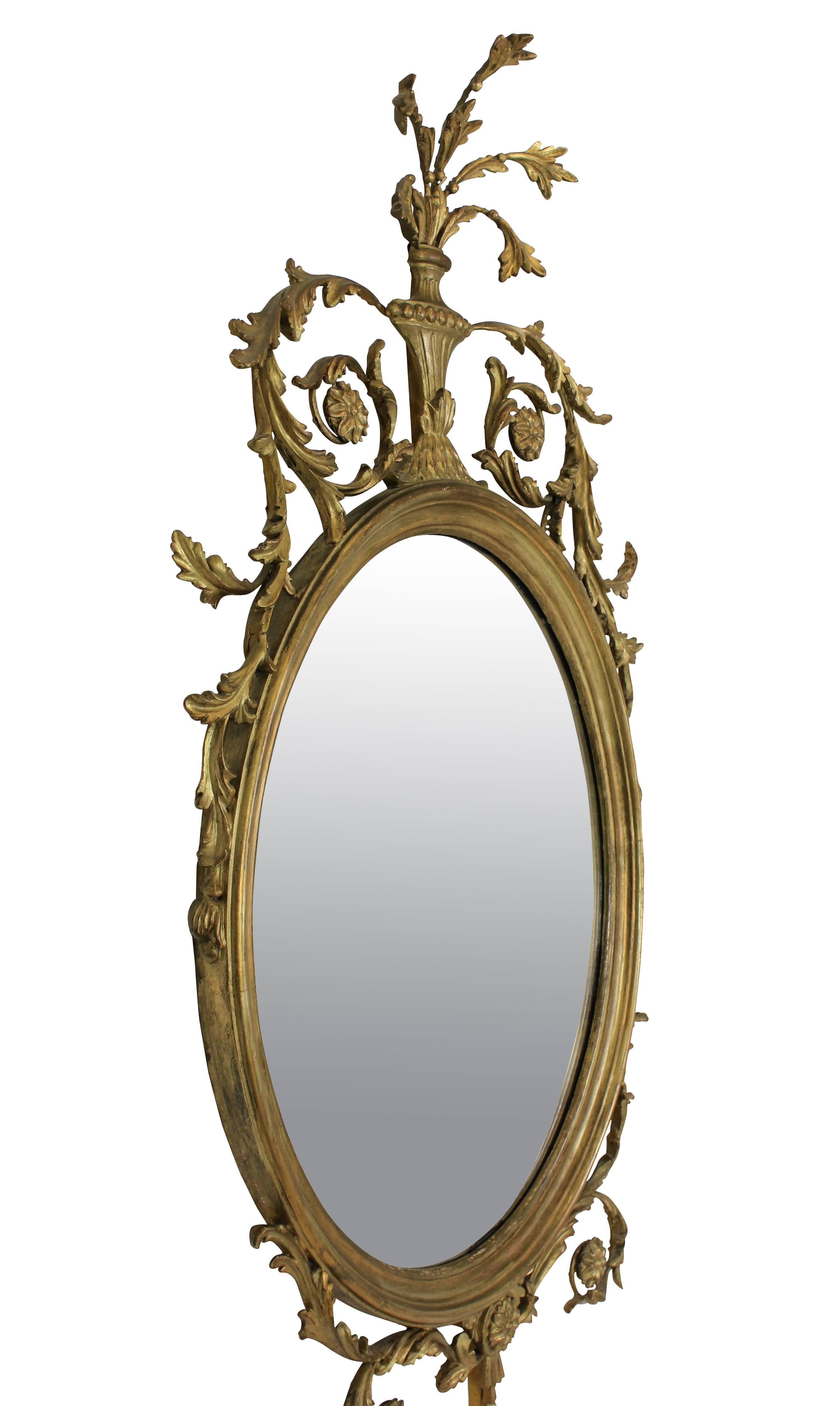 An English 'Adam' style giltwood mirror, nicely carved and water gilded.
   