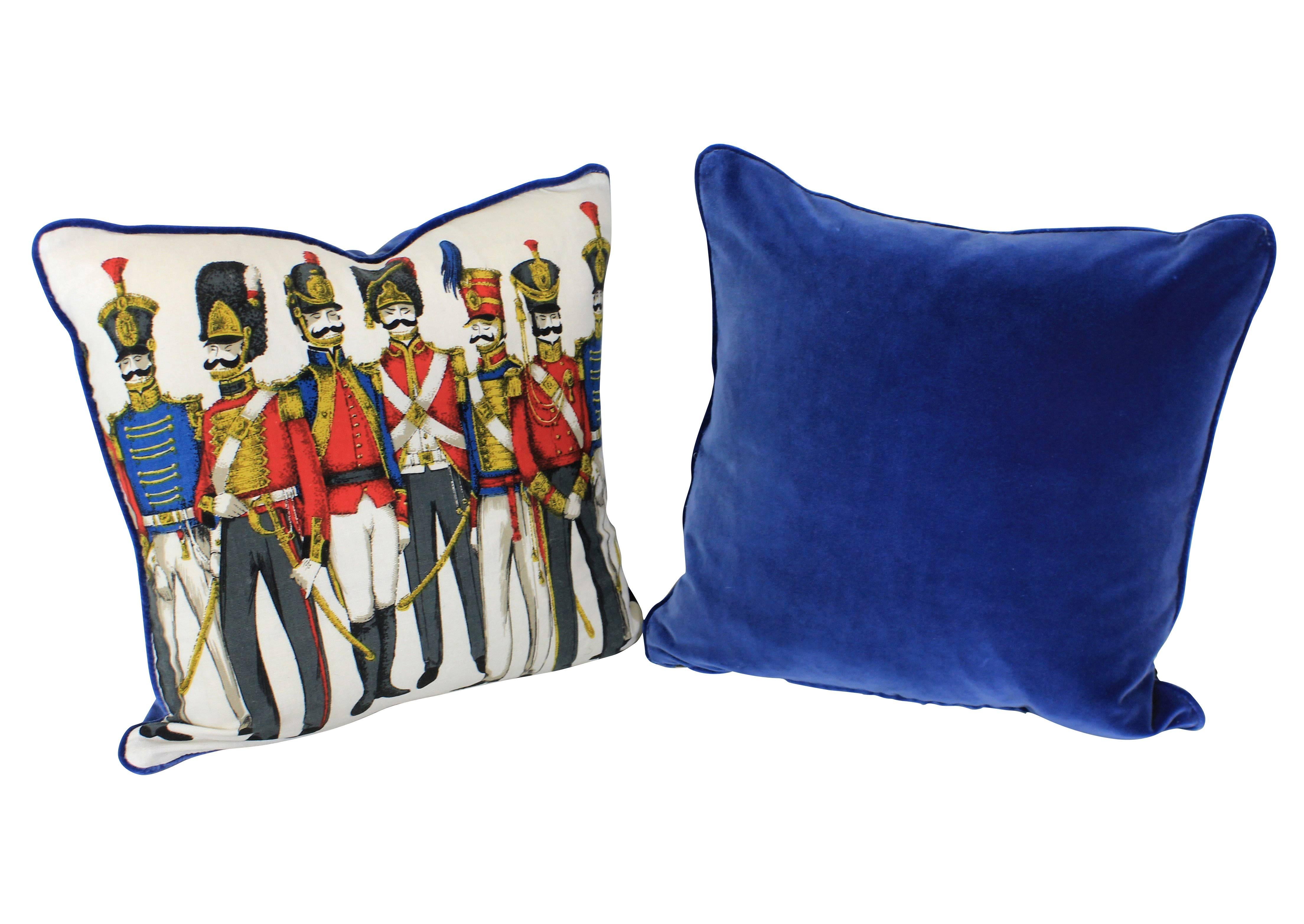 A set of four bespoke Fornasetti style handmade cushions, using a piece of 1960s fabric. Backed in blue velvet and with feather pads.
 