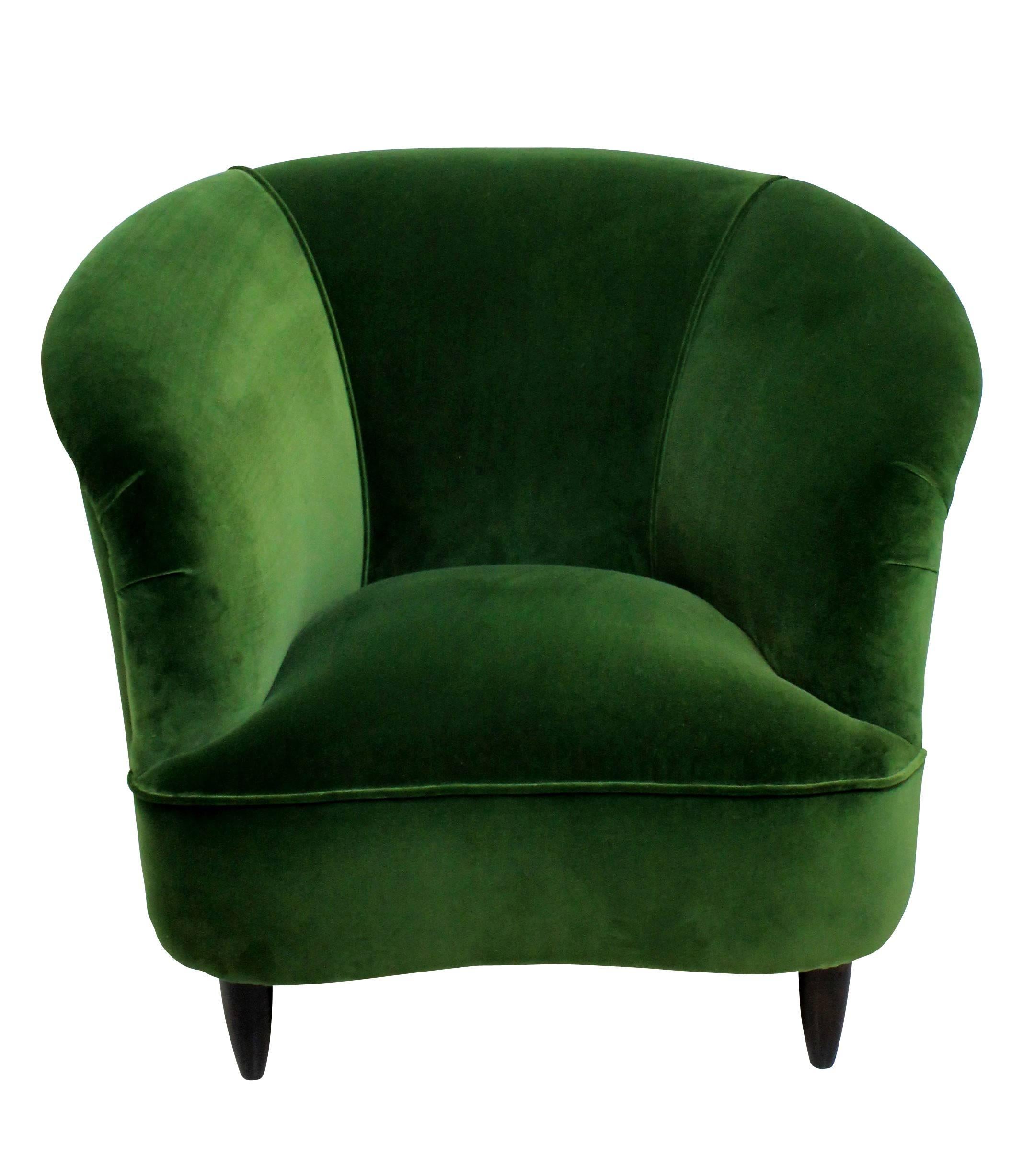 A pair of large Italian sculptural lounge chairs by Parisi. On turned French polished legs seen here in Emerald green velvet for illustration purposes and can be upholstered in a fabric of your choice.
   