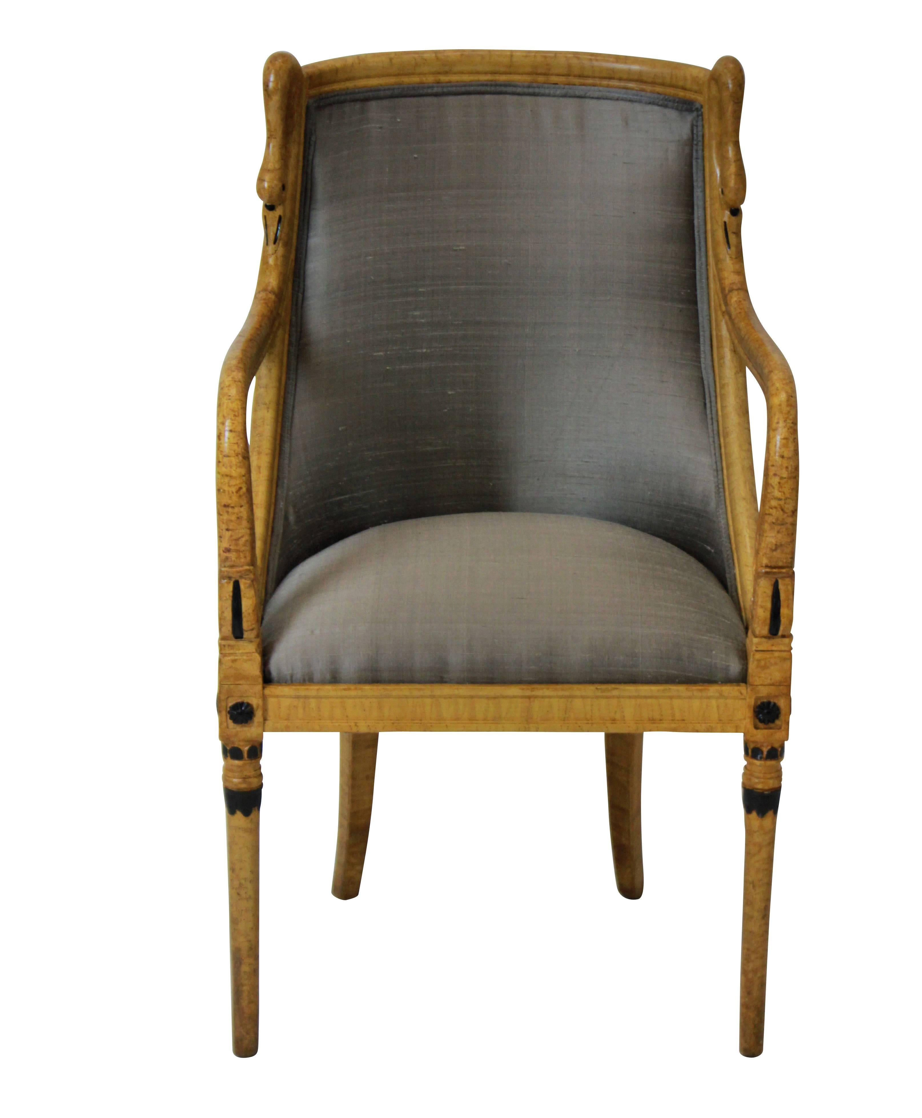 A Swedish simulated (painted) bur walnut Biedermeier swan neck desk chair. Newly restored and upholstered in stone colored dupion silk.
