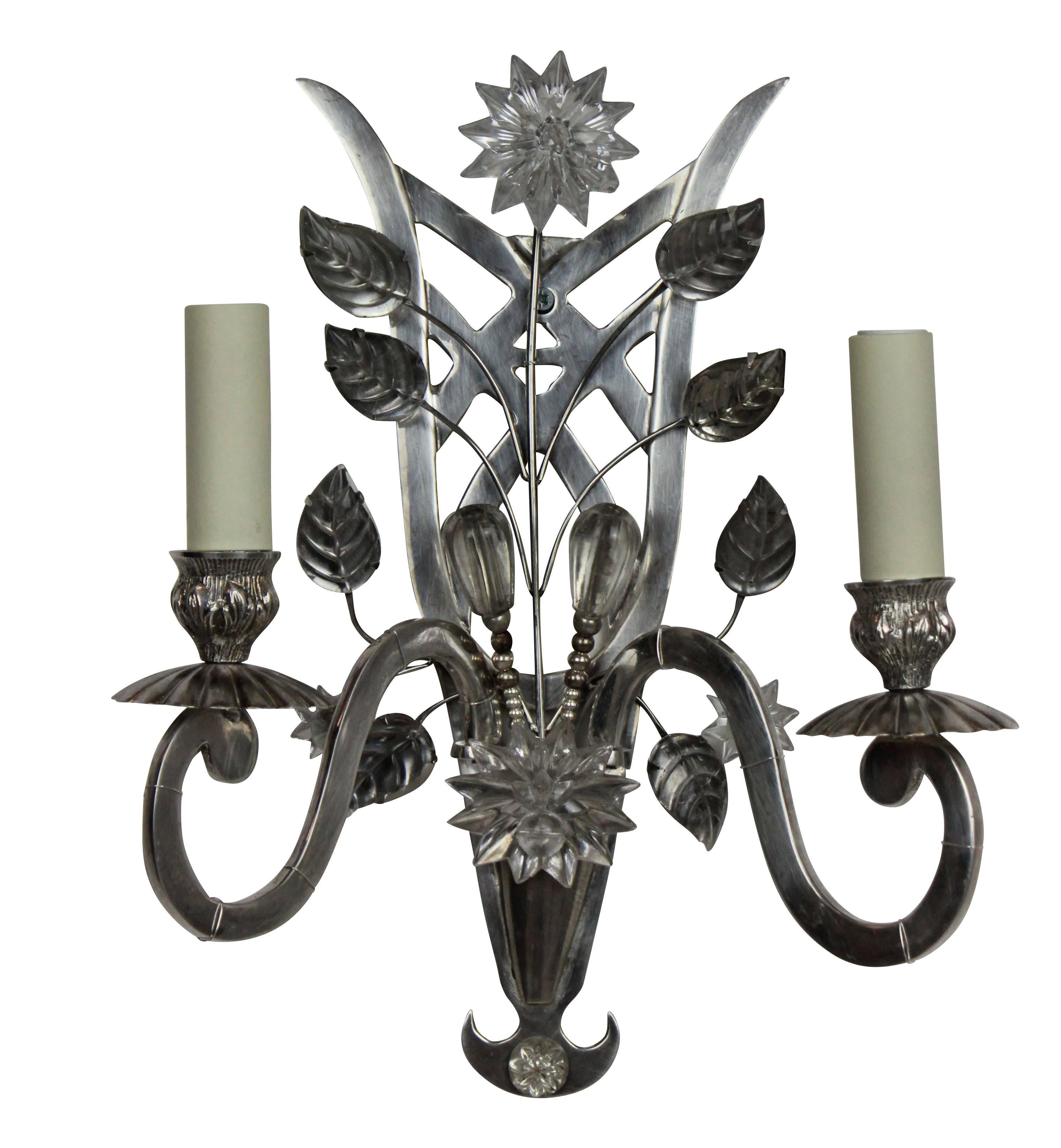 A set of six French wall sconces, in silver plate and with cut and moulded glass leaves and foliage.
     