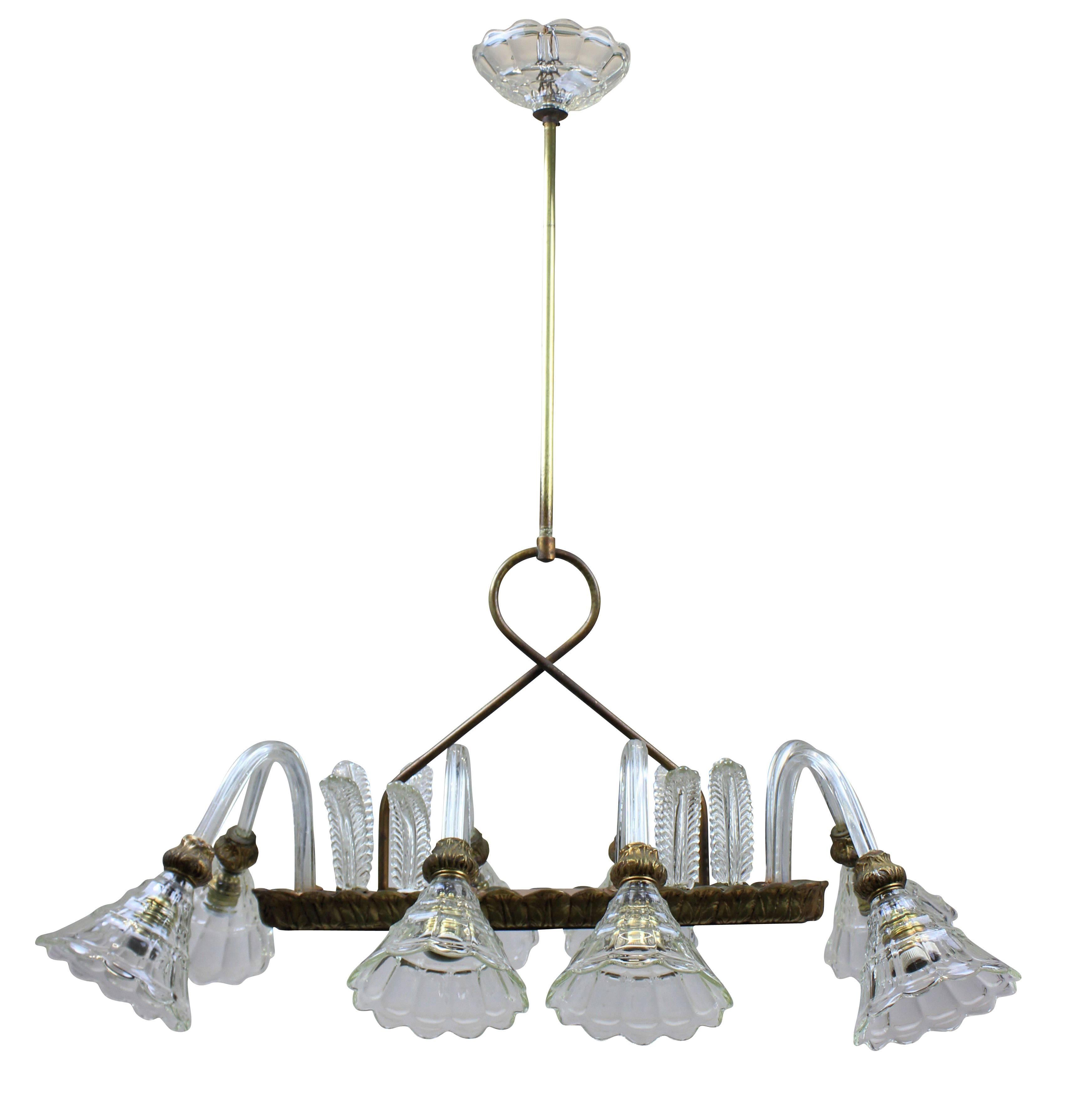 An eight-arm Barovier light of rectangular design. With handblown leaves, arms and cups and brass fittings.