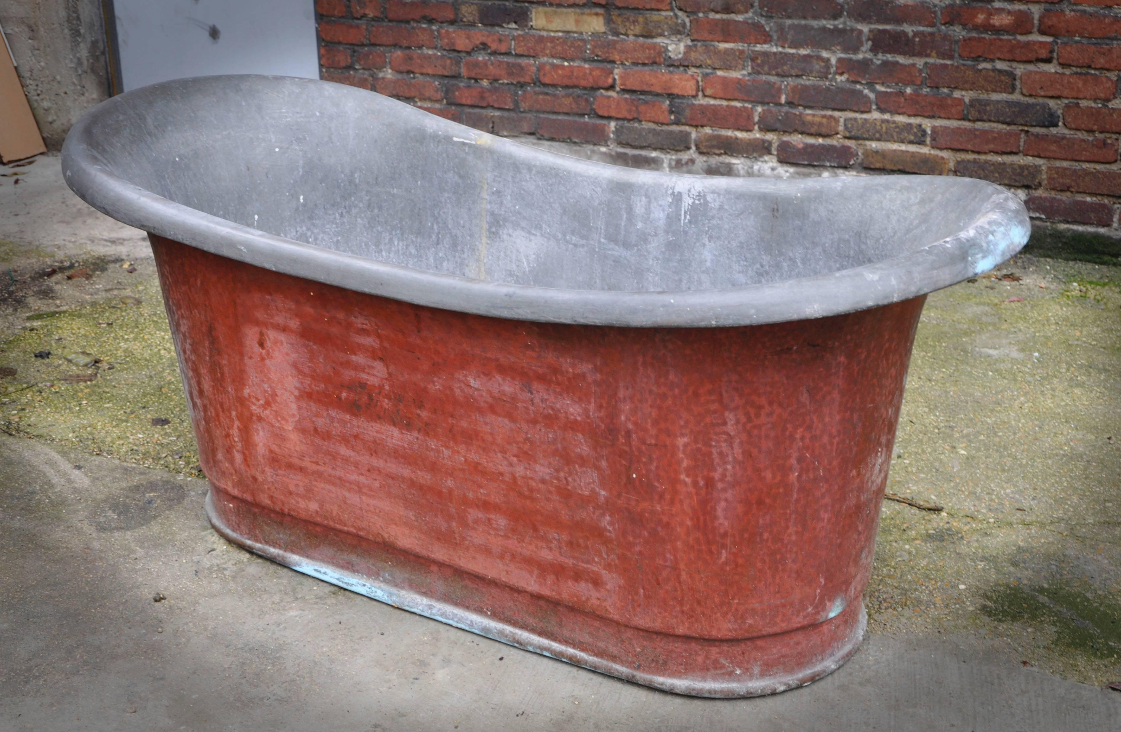 Beautiful and rare antique bathtub made out of tinned copper from the late 19th century. The interior is tinned to prevent copper oxidation.