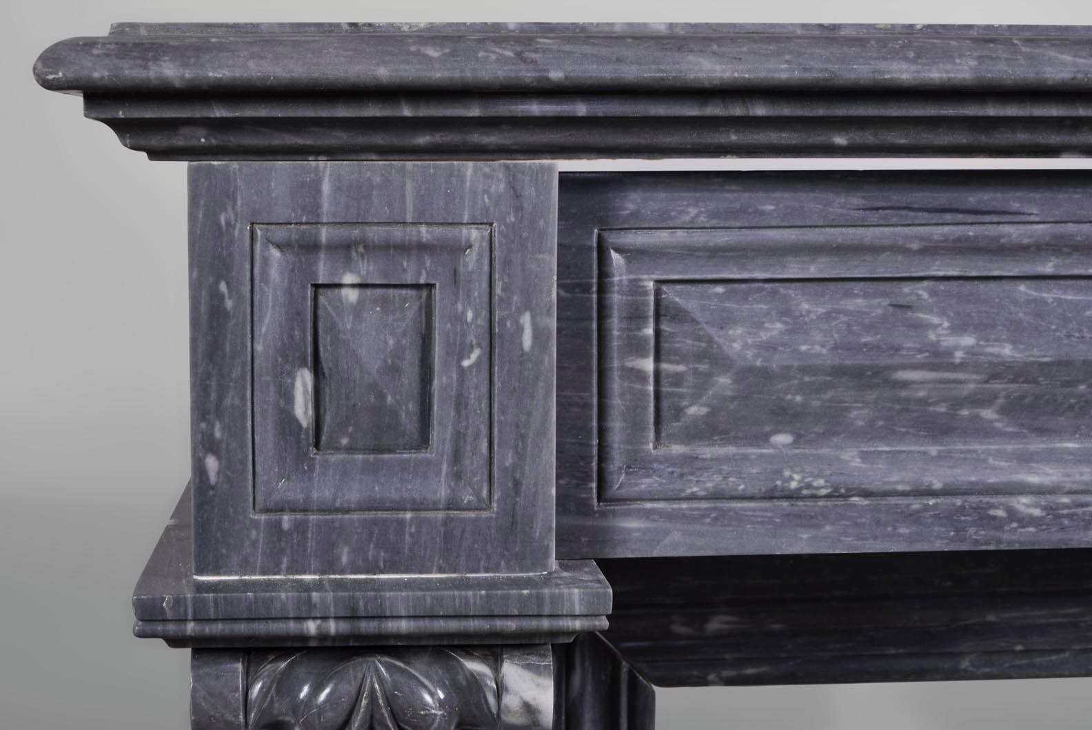 Carved Antique Napoleon III style fireplace in Blue Turquin marble, 19th c. For Sale