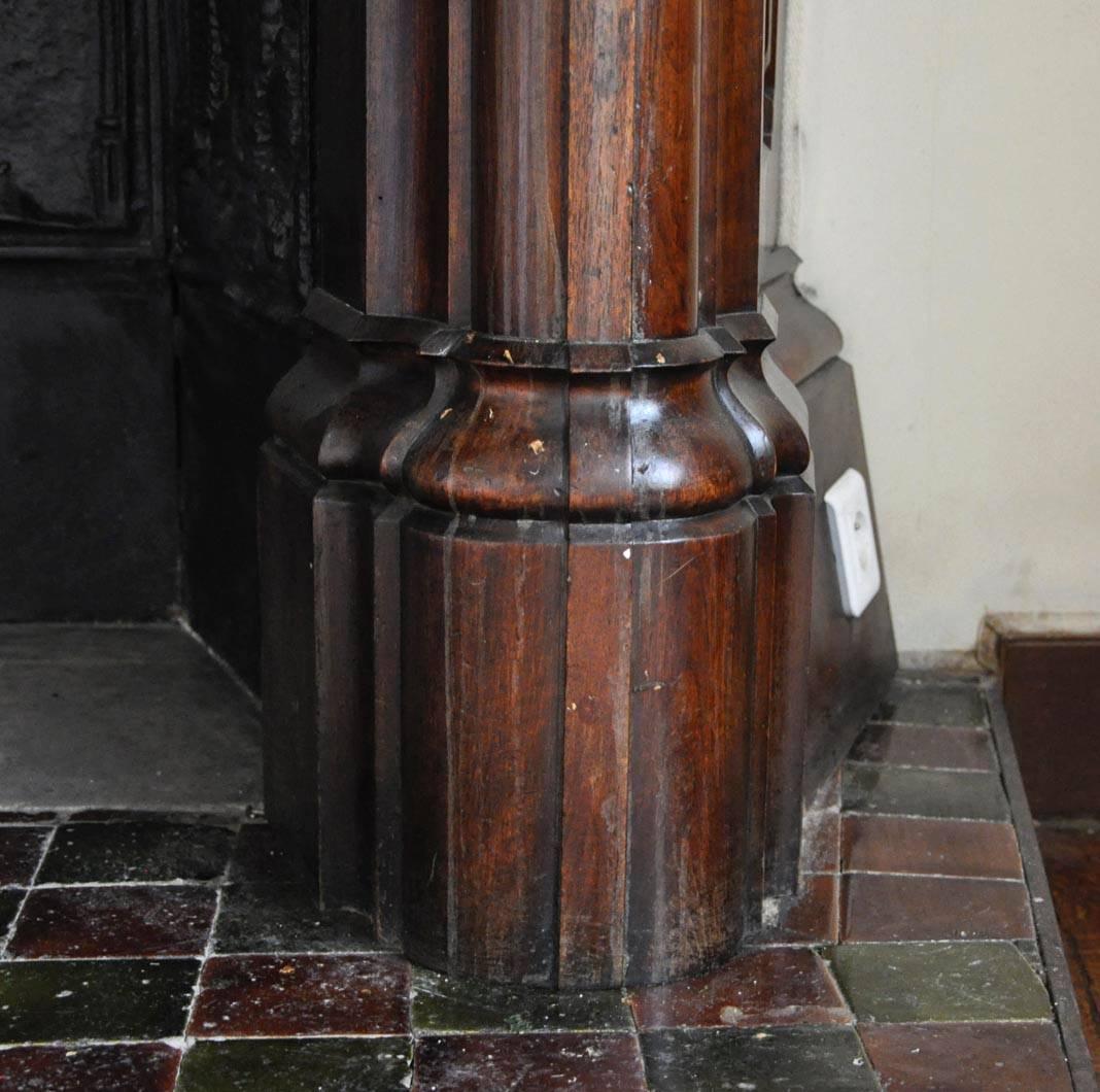 Gothic Revival Neo-Gothic style carved walnut fireplace with hood, 19th c. For Sale