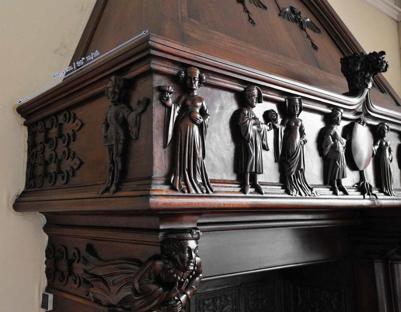 Neo-Gothic style carved walnut fireplace with hood, 19th c. In Good Condition For Sale In Saint Ouen, FR