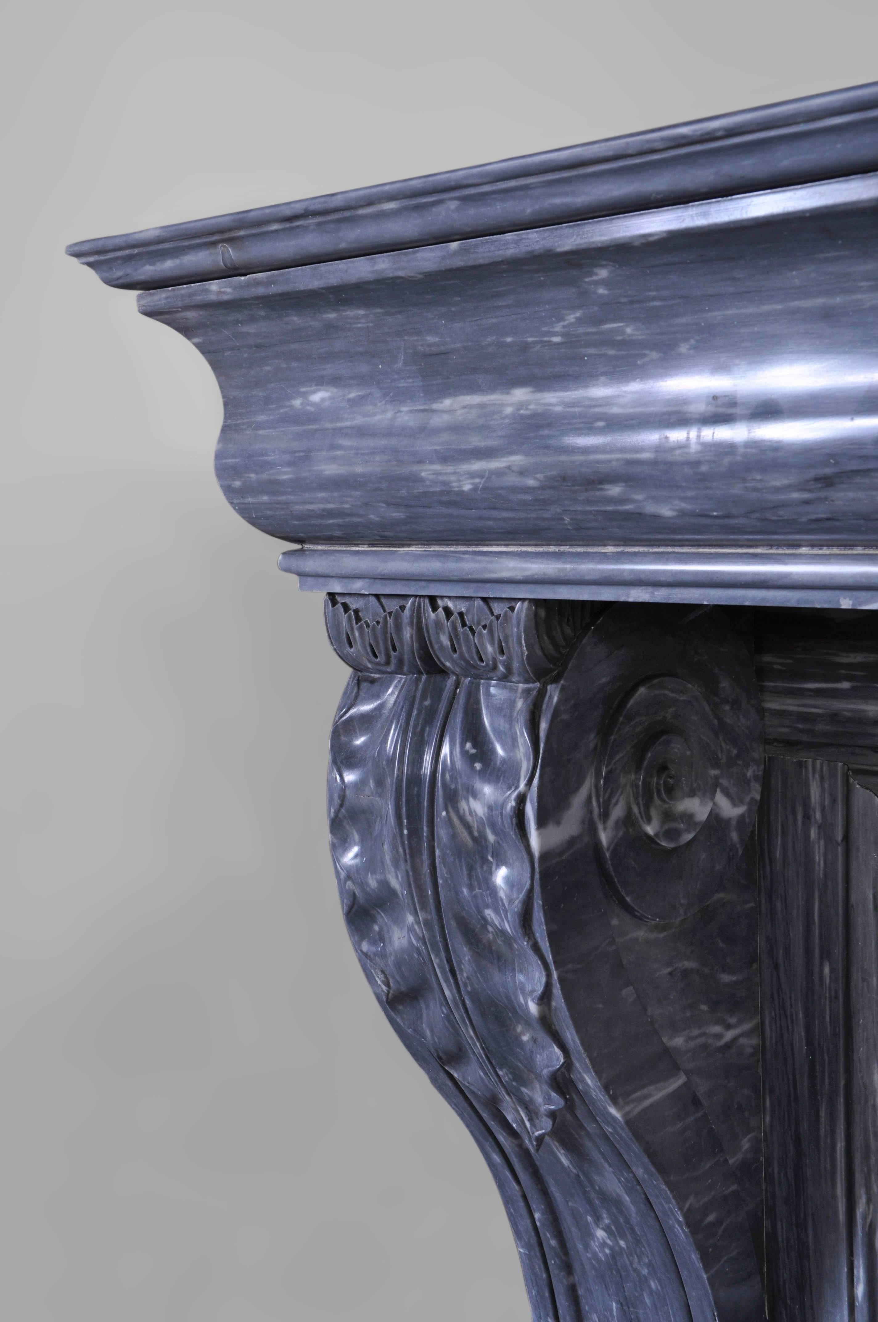 Carved Antique Restauration Style Fireplace with Lion's Paws in Blue Turquin Marble For Sale