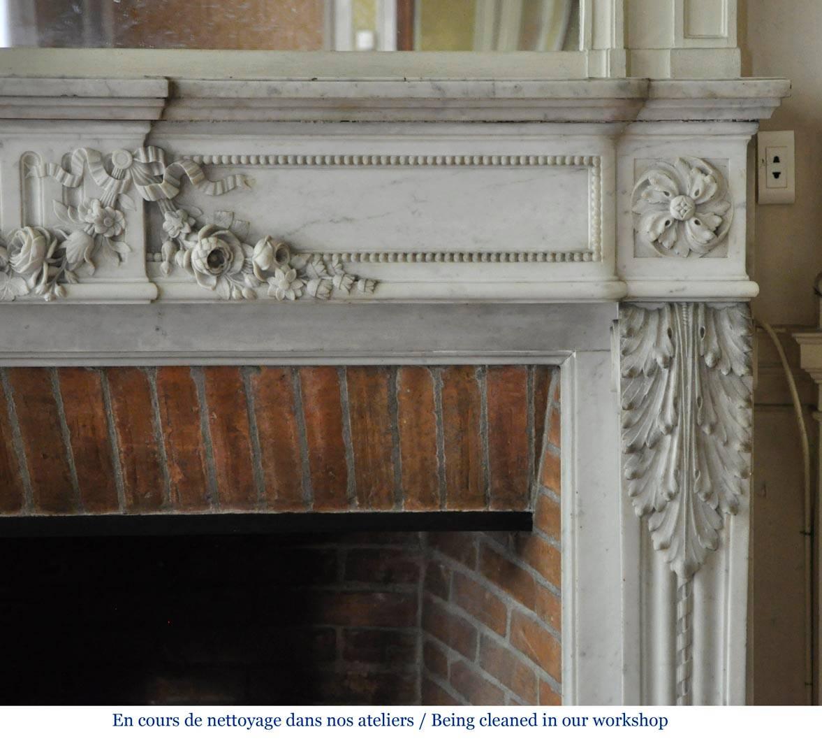 Louis XVI Style Fireplace in White Carrara Marble with Carved Garland of Flowers 1