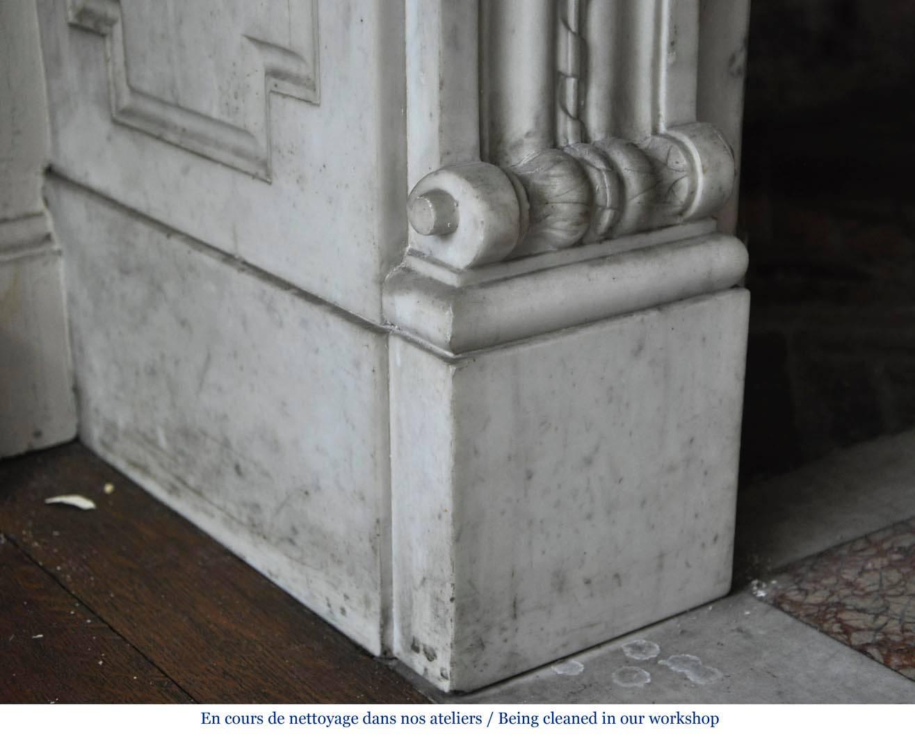 Louis XVI Style Fireplace in White Carrara Marble with Carved Garland of Flowers In Good Condition In Saint Ouen, FR
