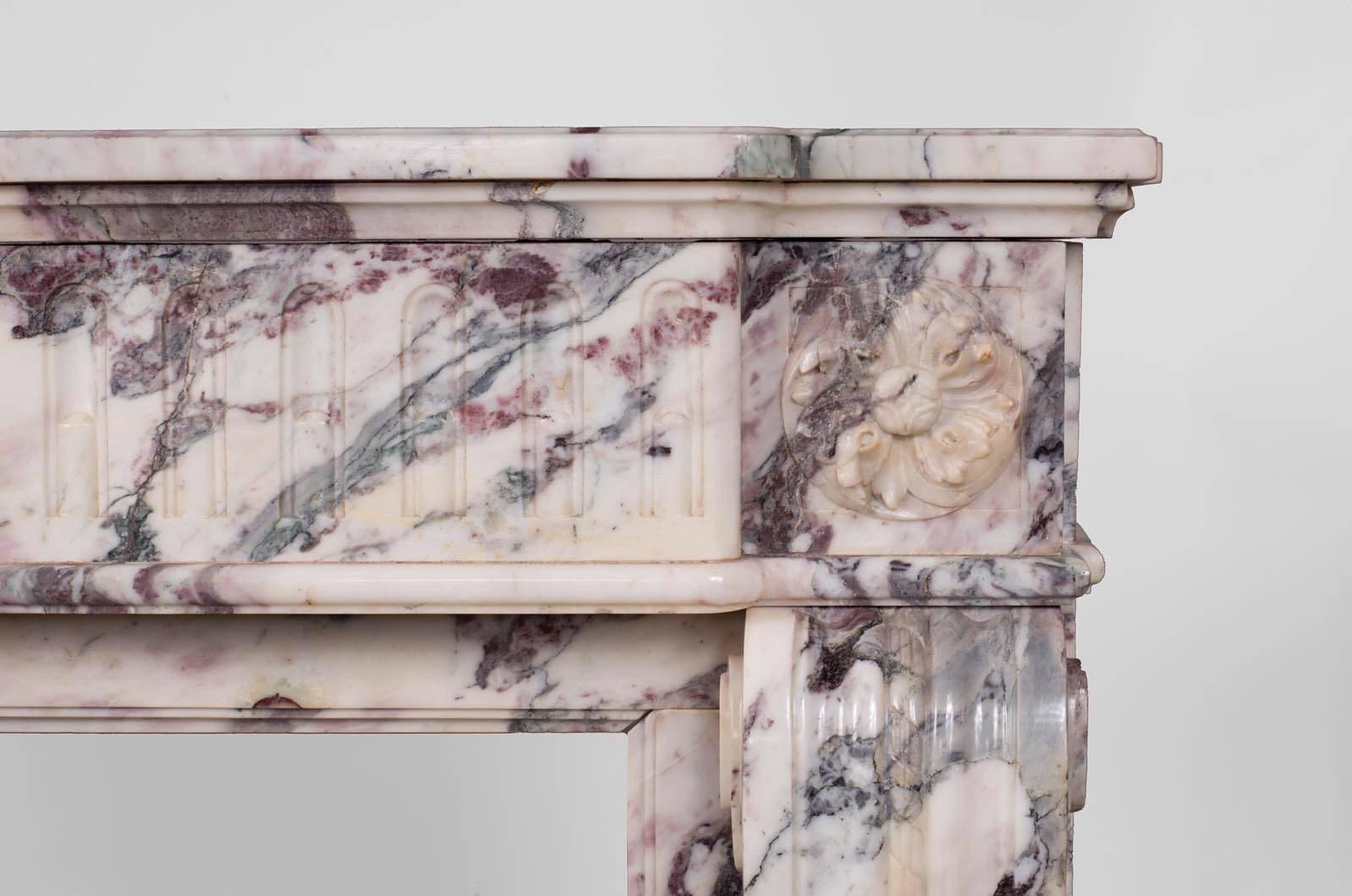 Carved Louis XVI Style Fireplace with Flutings Decor in Violet Breccia Marble For Sale
