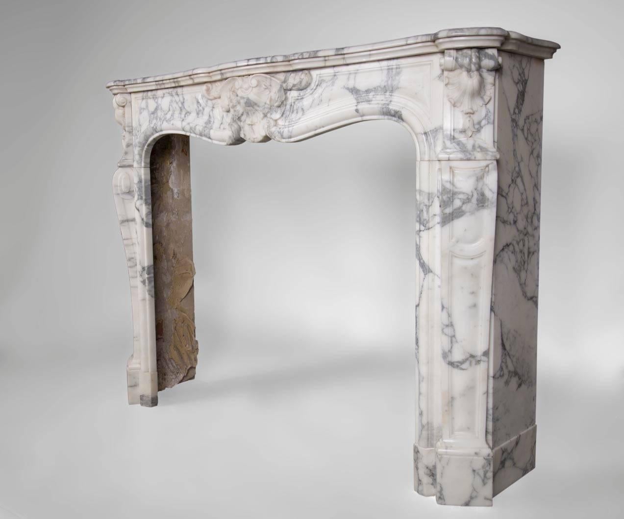 Carved Antique Louis XV Style Fireplace with Three Shells in Arabescato Marble